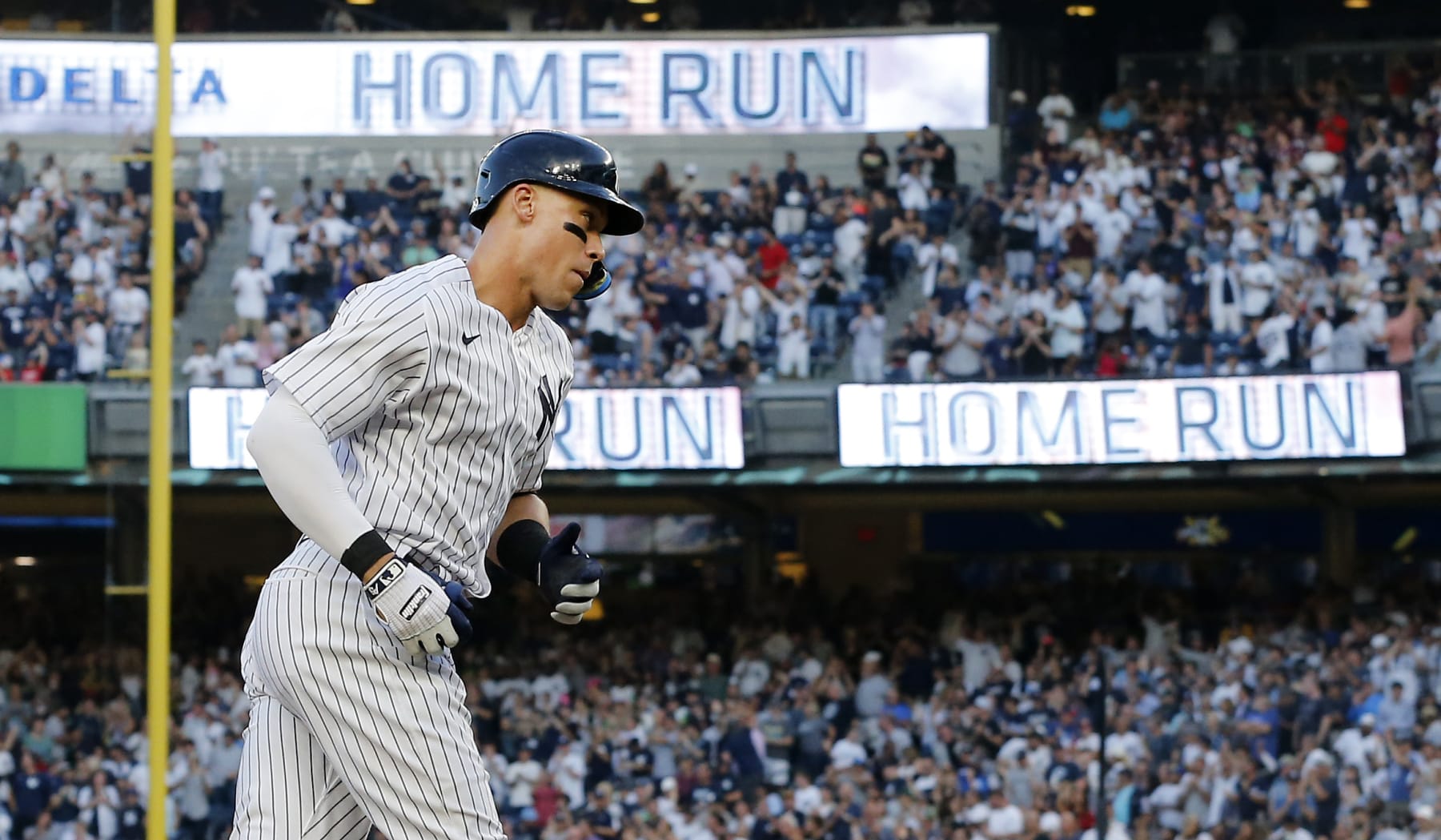 NEW YORK, NEW YORK - AUGUST 01:  Aaron Judge #99 of the New York Yankees runs the bases after his second inning two run home run against the Seattle Mariners at Yankee Stadium on August 01, 2022 in New York City. The Yankees defeated the Mariners 7-2. (Photo by Jim McIsaac/Getty Images)