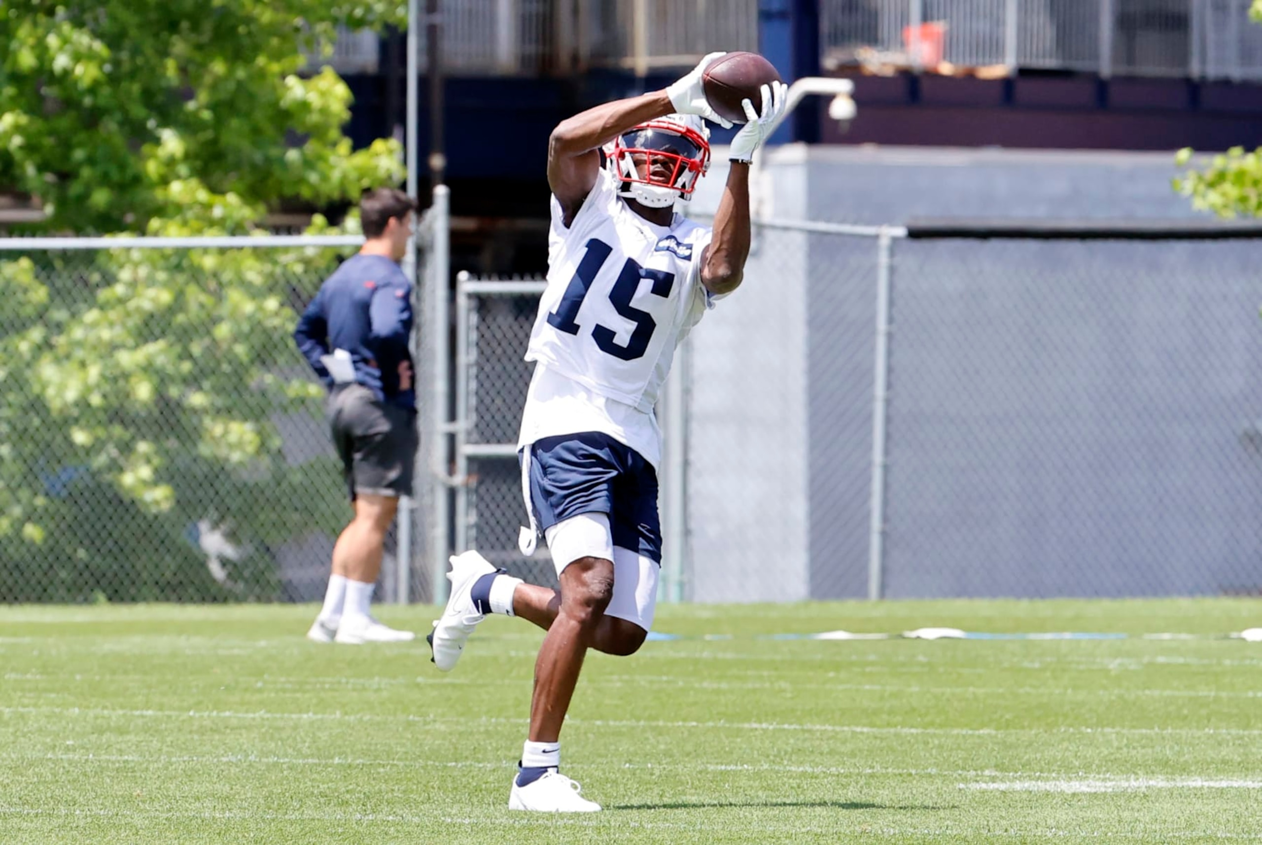 FOXBOROUGH, MA - JUNE 08: New England Patriots wide receiver Nelson Agholor (15) grabs a pass during Day 2 of mandatory New England Patriots minicamp on June 8, 2022, at the Patriots Training Facility at Gillette Stadium in Foxborough, Massachusetts. (Photo by Fred Kfoury III/Icon Sportswire via Getty Images)
