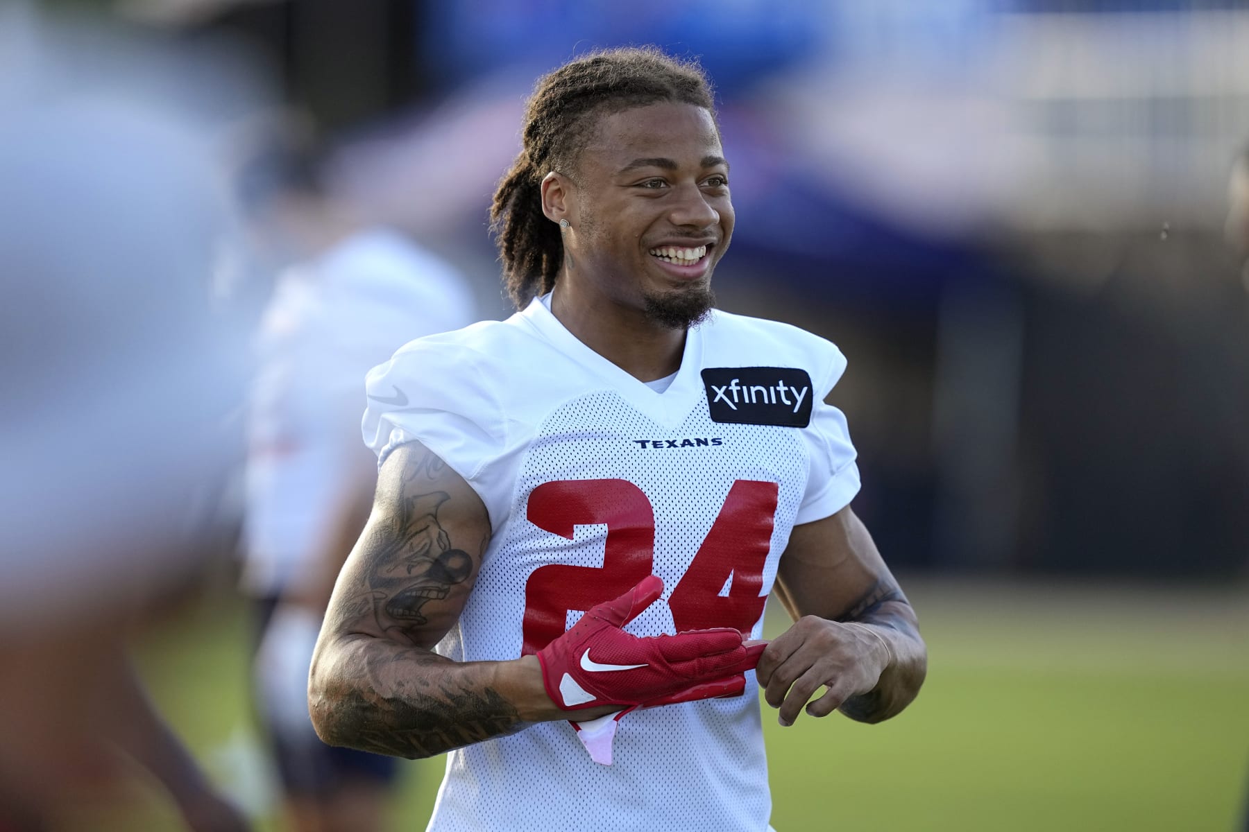 Houston Texans defensive back Derek Stingley Jr., waits for the start of an NFL football training camp practice Saturday, July 30, 2022, in Houston. (AP Photo/David J. Phillip)