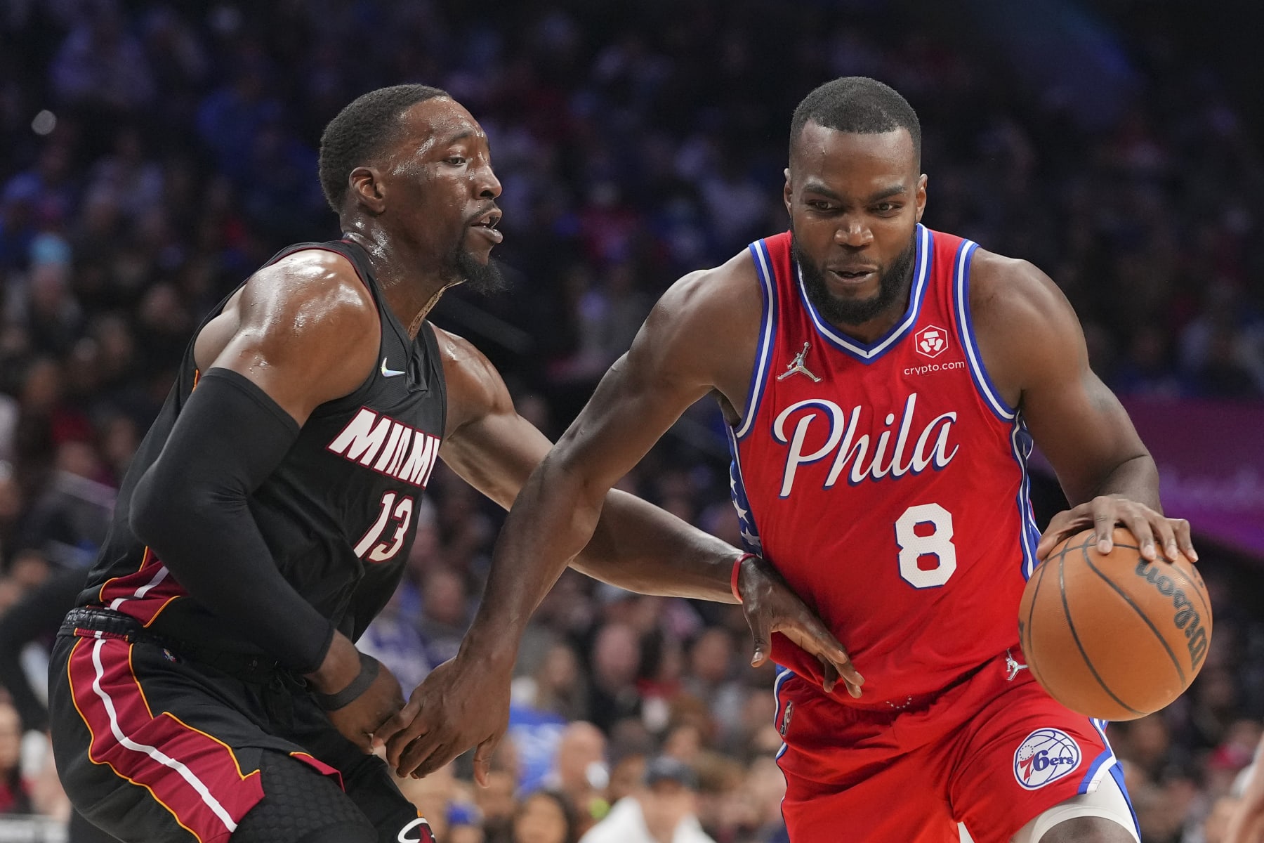 PHILADELPHIA, PA - MARCH 21: Paul Millsap #8 of the Philadelphia 76ers drives to the basket against Bam Adebayo #13 of the Miami Heat at the Wells Fargo Center on March 21, 2022 in Philadelphia, Pennsylvania. The 76ers defeated the Heat 113-106. NOTE TO USER: User expressly acknowledges and agrees that, by downloading and or using this photograph, User is consenting to the terms and conditions of the Getty Images License Agreement. (Photo by Mitchell Leff/Getty Images)