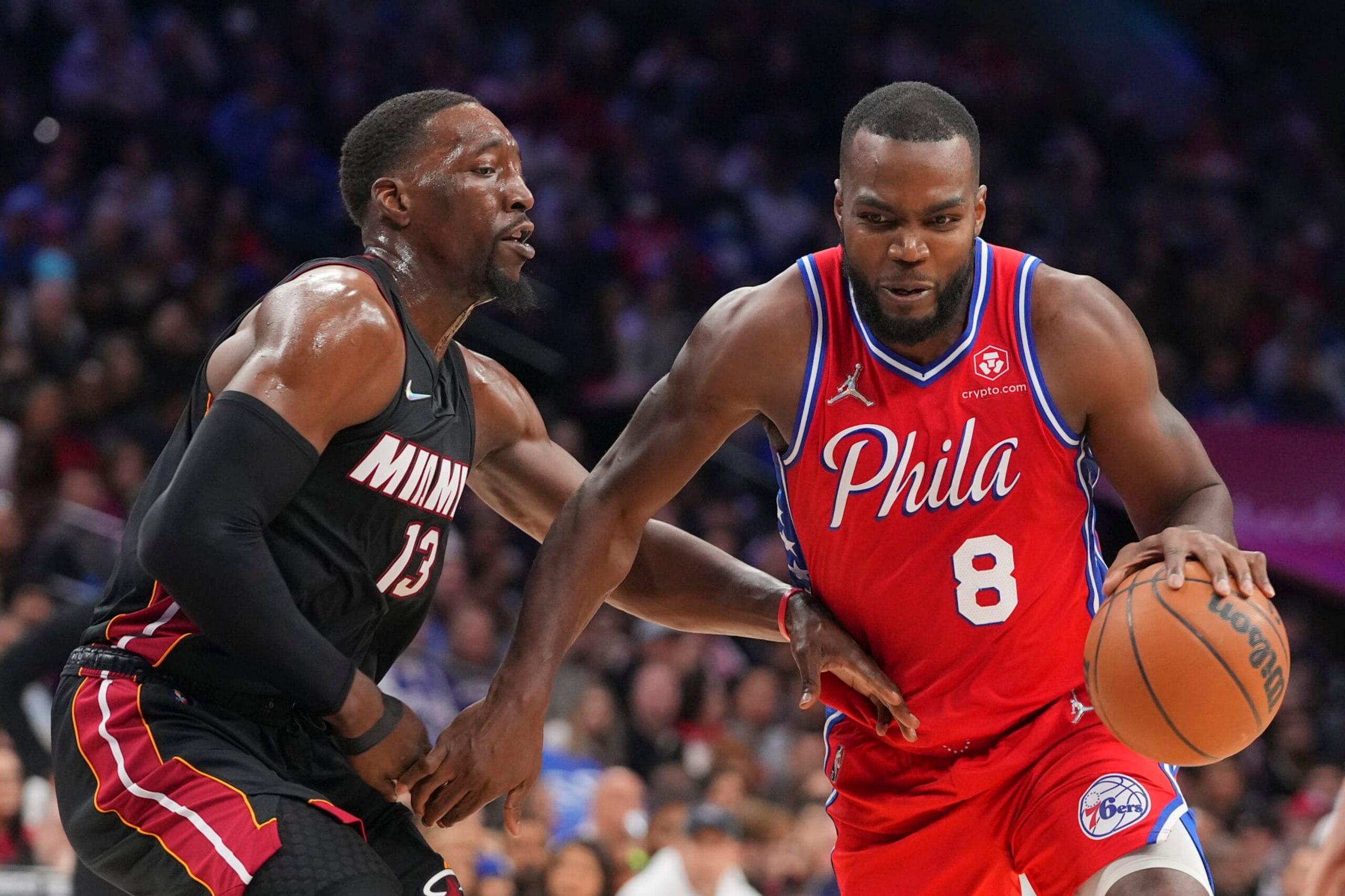 PHILADELPHIA, PA - MARCH 21: Paul Millsap #8 of the Philadelphia 76ers drives to the basket against Bam Adebayo #13 of the Miami Heat at the Wells Fargo Center on March 21, 2022 in Philadelphia, Pennsylvania. The 76ers defeated the Heat 113-106. NOTE TO USER: User expressly acknowledges and agrees that, by downloading and or using this photograph, User is consenting to the terms and conditions of the Getty Images License Agreement. (Photo by Mitchell Leff/Getty Images)