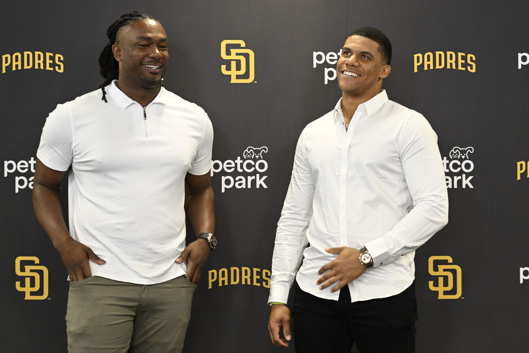 SAN DIEGO, CA - AUGUST 3:  Juan Soto #22 of the San Diego Padres, right, and Josh Bell #19 talk during a news conference held to introduce them to the team August 3, 2022 at Petco Park in San Diego, California. (Photo by Denis Poroy/Getty Images)