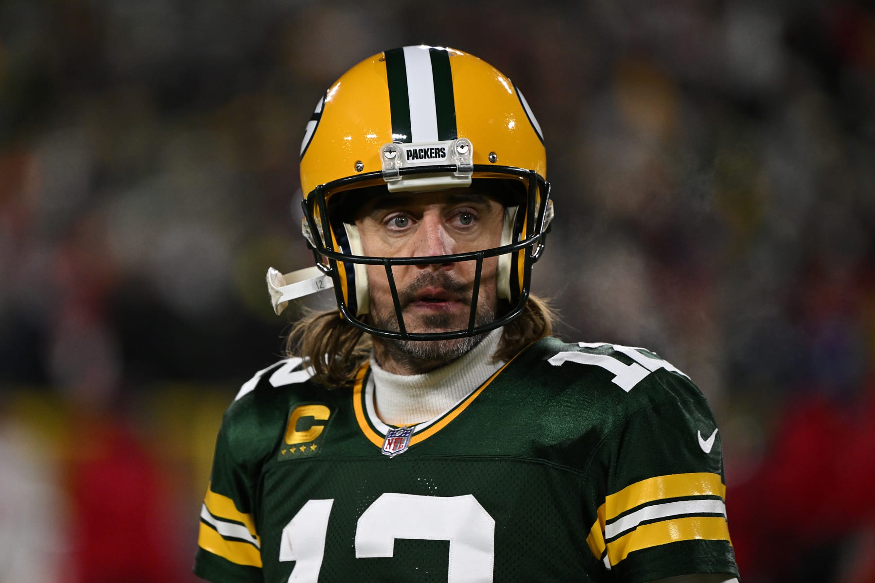 GREEN BAY, WISCONSIN - JANUARY 22: Aaron Rodgers #12 of the Green Bay Packers reacts during the game against the San Francisco 49ers in NFC Divisional Playoff game at Lambeau Field on January 22, 2022 in Green Bay, Wisconsin. (Photo by Stacy Revere/Getty Images) GREEN BAY, WISCONSIN - JANUARY 22: Aaron Rodgers #12 of the Green Bay Packers reacts during the game against the San Francisco 49ers in NFC Divisional Playoff game at Lambeau Field on January 22, 2022 in Green Bay, Wisconsin. (Photo by Stacy Revere/Getty Images)