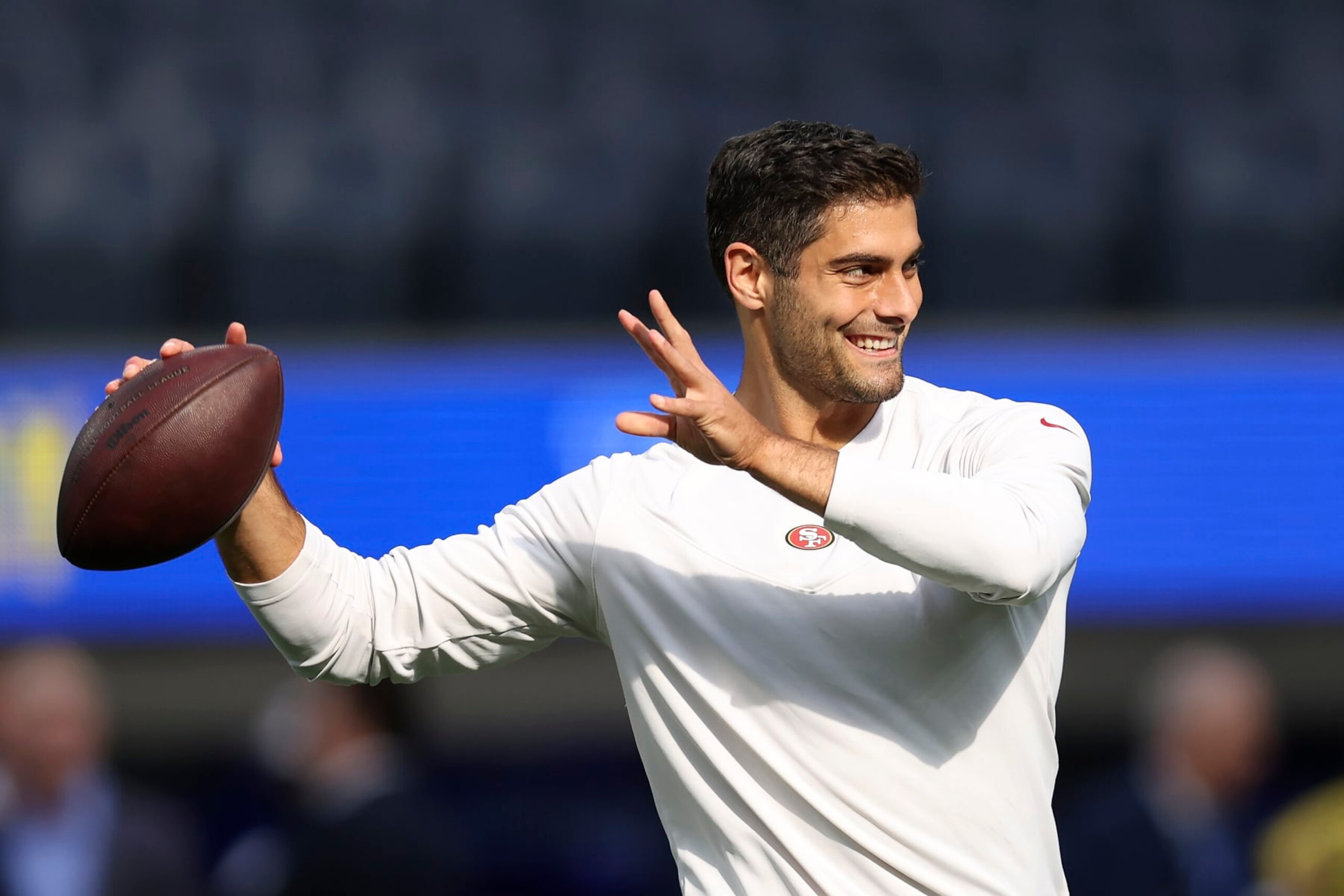 San Francisco 49ers' Jimmy Garoppolo warms up before the NFC Championship NFL football game against the Los Angeles Rams Sunday, Jan. 30, 2022, in Inglewood, Calif. (AP Photo/Jed Jacobsohn)