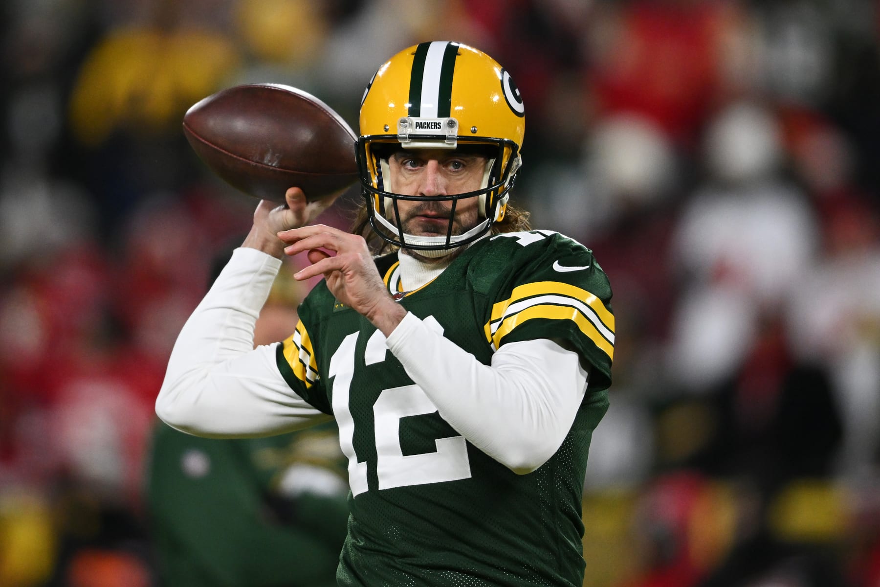 GREEN BAY, WISCONSIN - JANUARY 22:  Quarterback Aaron Rodgers #12 of the Green Bay Packers warms up prior to the NFC Divisional Playoff game against the San Francisco 49ers at Lambeau Field on January 22, 2022 in Green Bay, Wisconsin. (Photo by Quinn Harris/Getty Images)