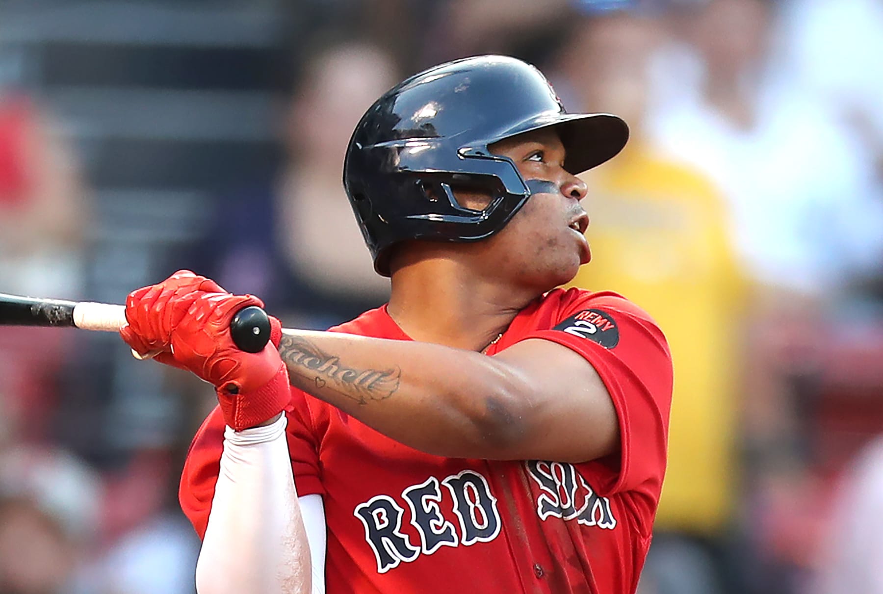 Boston, MA - July 22: Boston Red Sox third baseman Rafael Devers watches his 1st inning double careen off the Green Monster. (Photo by John Tlumacki/The Boston Globe via Getty Images)
