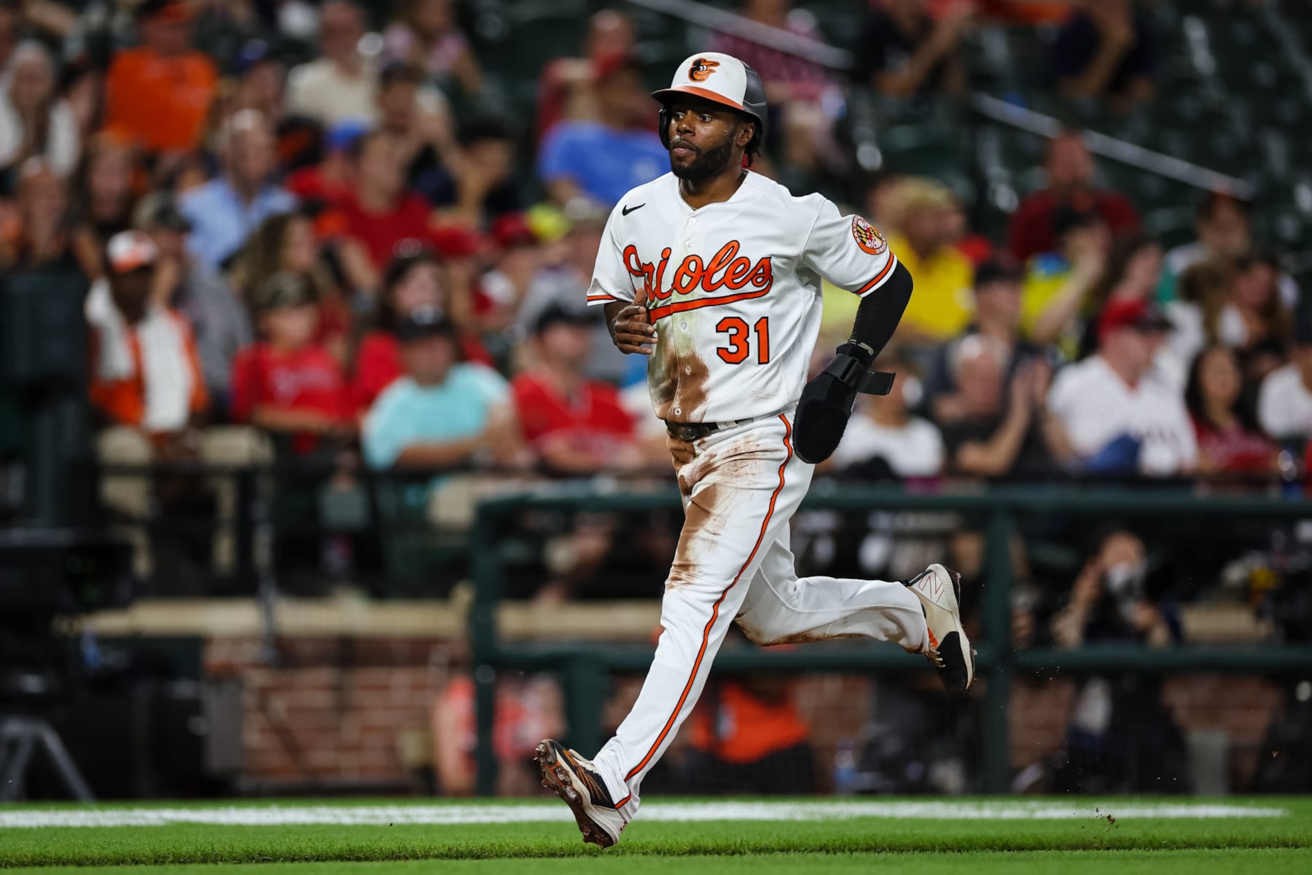 BALTIMORE, MD - JULY 07: Cedric Mullins #31 of the Baltimore Orioles scores a run against the Los Angeles Angels during the fifth inning at Oriole Park at Camden Yards on July 7, 2022 in Baltimore, Maryland. (Photo by Scott Taetsch/Getty Images)