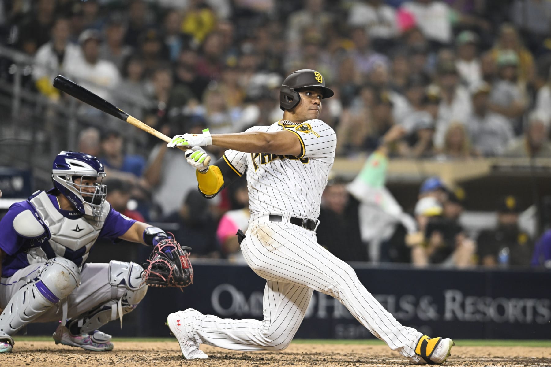 SAN DIEGO, CA - AUGUST 3: Juan Soto #22 of the San Diego Padres hits a single in the eighth inning against the Colorado Rockies August 3, 2022 at Petco Park in San Diego, California. (Photo by Denis Poroy/Getty Images)