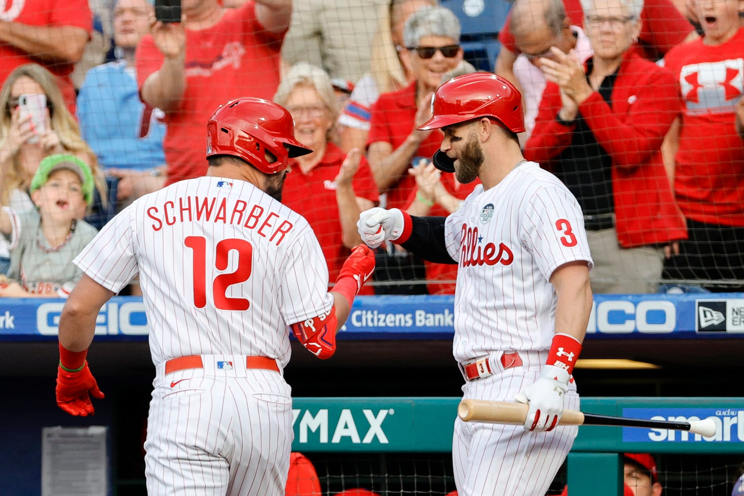 PHILADELPHIA, PENNSYLVANIA - JUNE 03: Kyle Schwarber #12 and Bryce Harper #3 of the Philadelphia Phillies celebrate a home run scored by Schwarber during the first inning against the Los Angeles Angels at Citizens Bank Park on June 03, 2022 in Philadelphia, Pennsylvania. (Photo by Tim Nwachukwu/Getty Images)