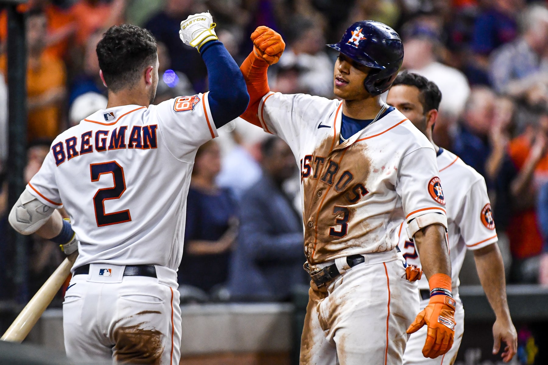 HOUSTON, TEXAS - JULY 05: Jeremy Pena #3 of the Houston Astros celebrates with Alex Bregman #2 of the Houston Astros after hitting a solo game tying home run in the fourth inning against the Kansas City Royals at Minute Maid Park on July 05, 2022 in Houston, Texas. (Photo by Logan Riely/Getty Images)