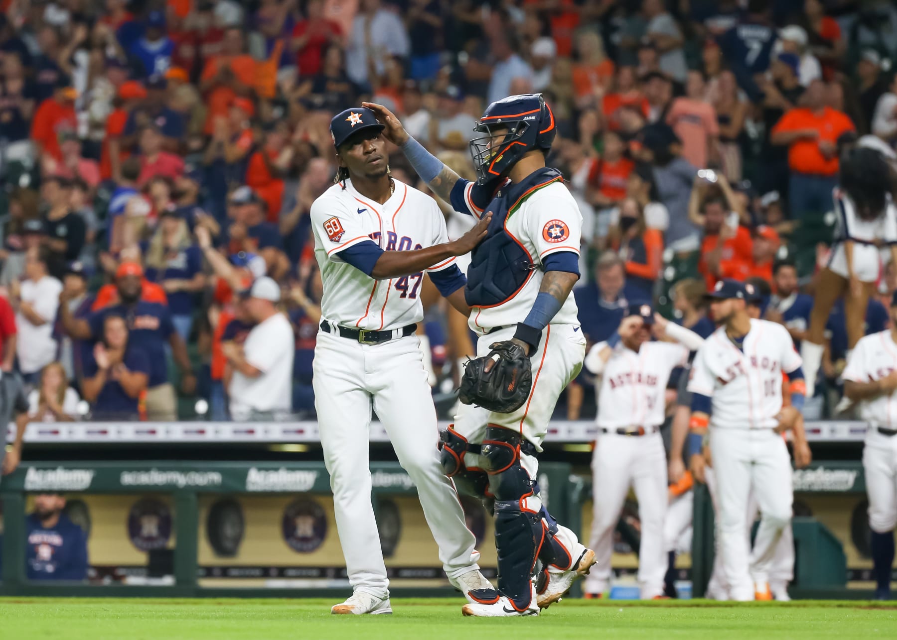 HOUSTON, TX - JULY 05:  Houston Astros relief pitcher Rafael Montero (47) and Houston Astros catcher Martin Maldonado (15) hug after their 9-7 win during the MLB game between the Kansas City Royals and Houston Astros on July 5, 2022 at Minute Maid Park in Houston, Texas.  (Photo by Leslie Plaza Johnson/Icon Sportswire via Getty Images)