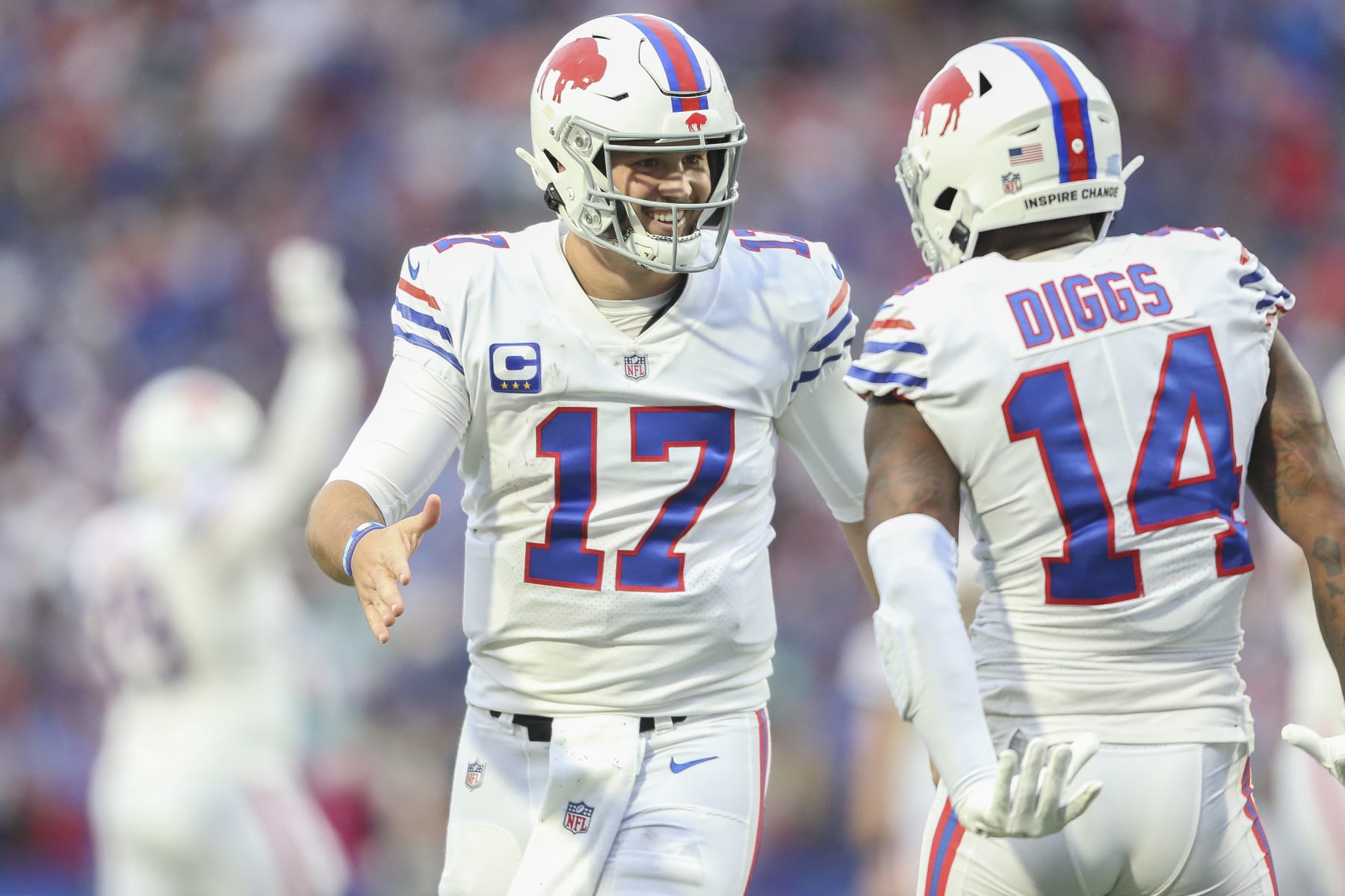 ORCHARD PARK, NEW YORK - OCTOBER 31: Josh Allen #17 and Stefon Diggs #14 of the Buffalo Bills celebrate a touchdown catch by Diggs during the fourth quarter against the Miami Dolphins at Highmark Stadium on October 31, 2021 in Orchard Park, New York. (Photo by Joshua Bessex/Getty Images)