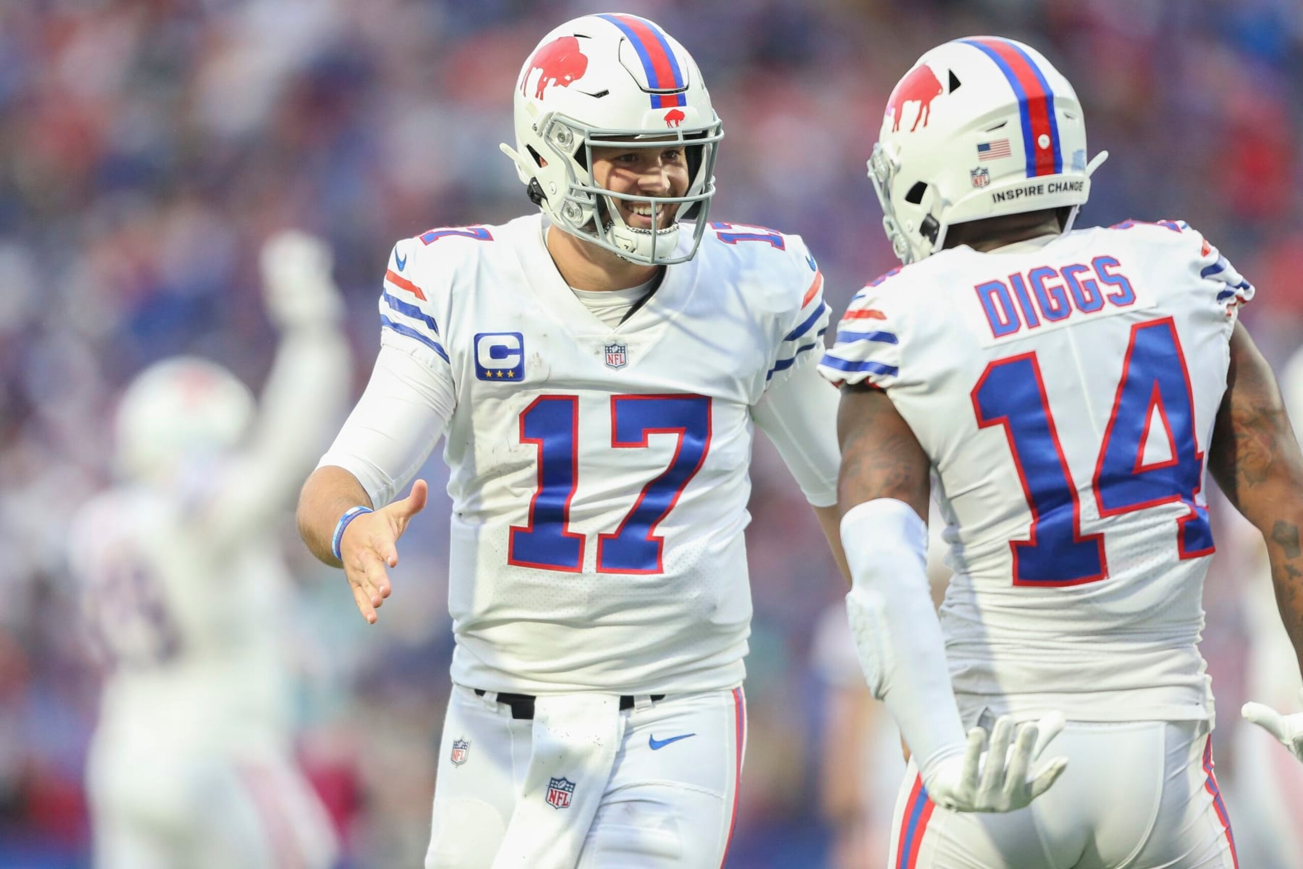 ORCHARD PARK, NEW YORK - OCTOBER 31: Josh Allen #17 and Stefon Diggs #14 of the Buffalo Bills celebrate a touchdown catch by Diggs during the fourth quarter against the Miami Dolphins at Highmark Stadium on October 31, 2021 in Orchard Park, New York. (Photo by Joshua Bessex/Getty Images)