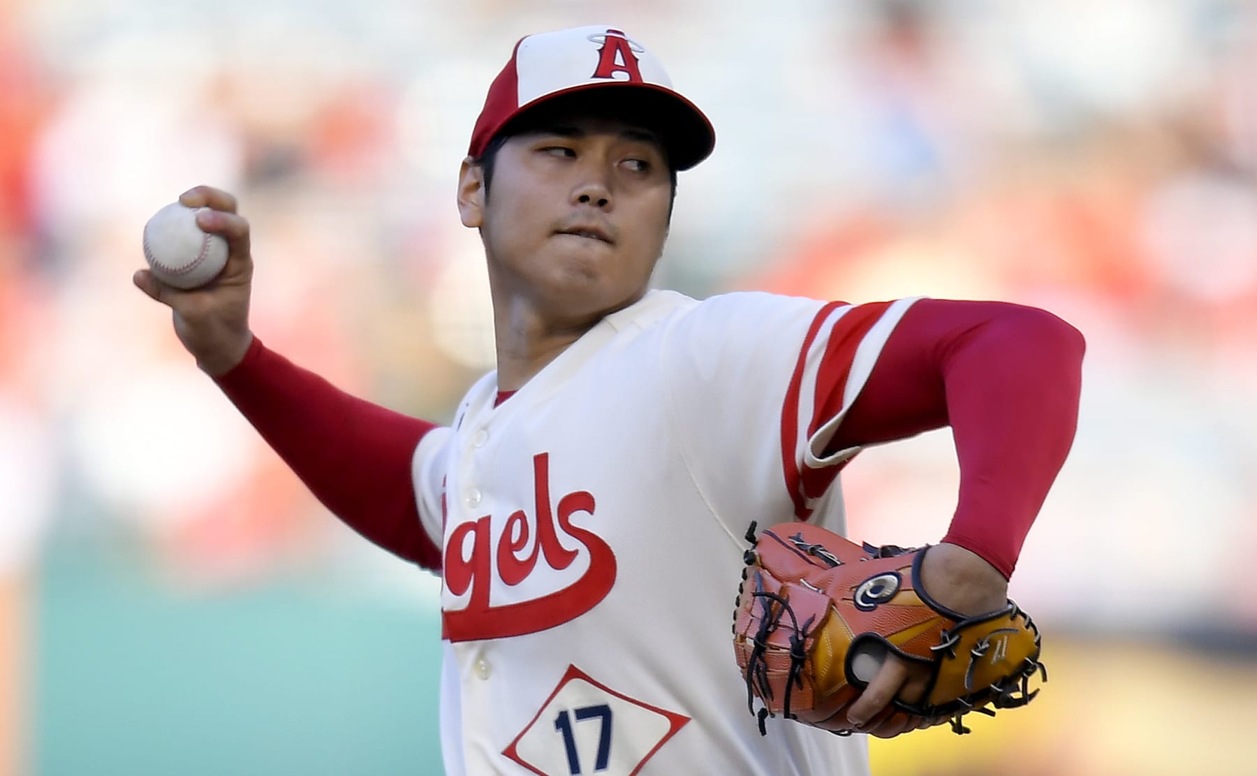 ANAHEIM, CA - AUGUST 03: Shohei Ohtani #17 of the Los Angeles Angels pitches against the Oakland Athletics in the first inning at Angel Stadium of Anaheim on August 3, 2022 in Anaheim, California. (Photo by John McCoy/Getty Images)