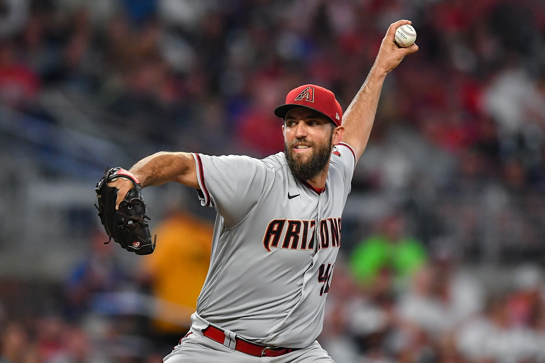 ATLANTA, GA  JULY 29:  Arizona starting pitcher Madison Bumgarner (40) throws a pitch during the MLB game between the Arizona Diamondbacks and the Atlanta Braves on July 29th, 2022 at Truist Park in Atlanta, GA. (Photo by Rich von Biberstein/Icon Sportswire via Getty Images)