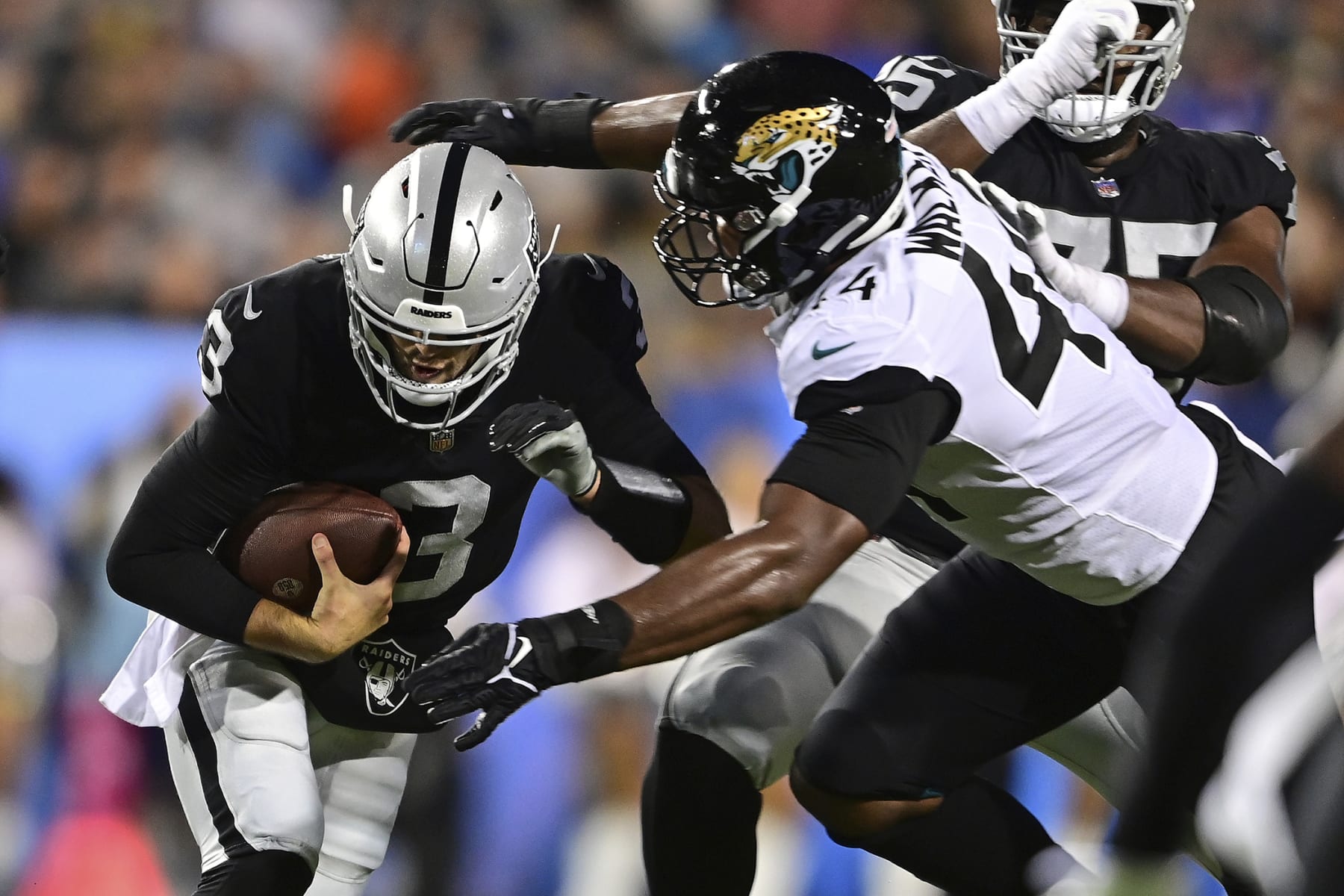 Las Vegas Raiders quarterback Jarrett Stidham (3) is sacked by Jacksonville Jaguars linebacker Travon Walker (44) during the first half of the NFL football exhibition Hall of Fame Game, Thursday, Aug. 4, 2022, in Canton, Ohio. (AP Photo/David Dermer) Las Vegas Raiders quarterback Jarrett Stidham (3) is sacked by Jacksonville Jaguars linebacker Travon Walker (44) during the first half of the NFL football exhibition Hall of Fame Game, Thursday, Aug. 4, 2022, in Canton, Ohio. (AP Photo/David Dermer)