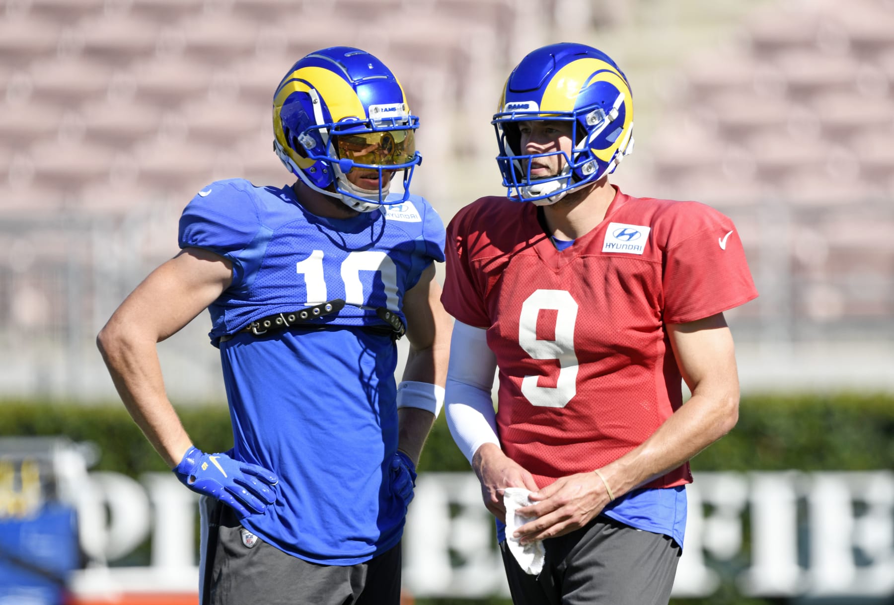 PASADENA, CA - FEBRUARY 10: Quarterback Matthew Stafford #9 and wide receiver Cooper Kupp #10 of the Los Angeles Rams talk during practice in preparation for Super Bowl LVI at the Rose Bowl on February 10, 2022 in Pasadena, California.The Rams play against the Cincinnati Bengals on Sunday. (Photo by Kevork Djansezian/Getty Images)