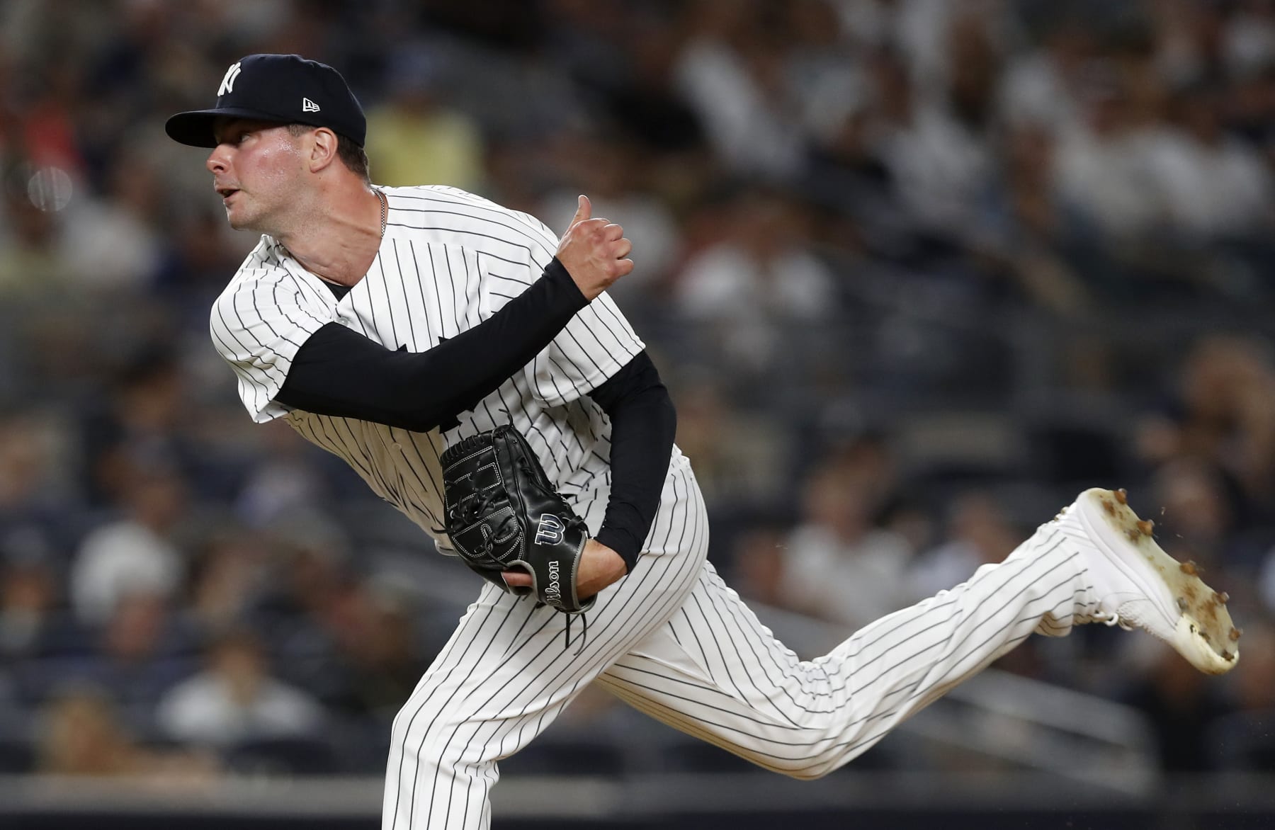 NEW YORK, NEW YORK - AUGUST 02:  Scott Effross #59 of the New York Yankees in action against the ssat Yankee Stadium on August 02, 2022 in the Bronx borough of New York City. The Mariners defeated the Yankees 8-6. (Photo by Jim McIsaac/Getty Images)