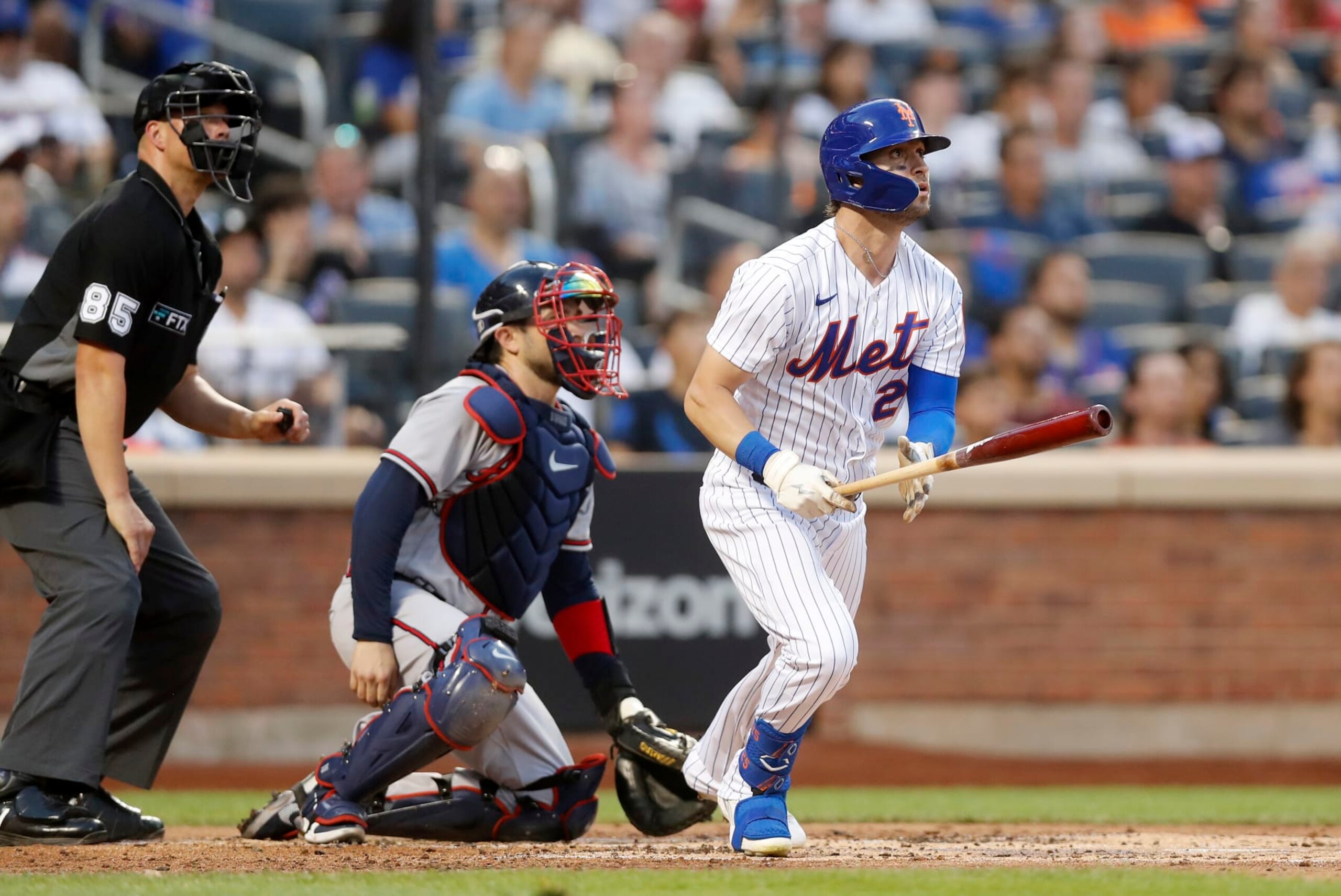 NEW YORK, NEW YORK - AUGUST 04: Tyler Naquin #25 of the New York Mets follows through on his second inning home run against the Atlanta Braves at Citi Field on August 04, 2022 in New York City. The Mets defeated the Braves 6-4. (Photo by Jim McIsaac/Getty Images) NEW YORK, NEW YORK - AUGUST 04: Tyler Naquin #25 of the New York Mets follows through on his second inning home run against the Atlanta Braves at Citi Field on August 04, 2022 in New York City. The Mets defeated the Braves 6-4. (Photo by Jim McIsaac/Getty Images)