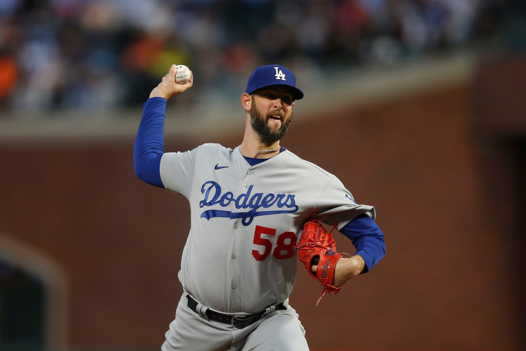 SAN FRANCISCO, CALIFORNIA - AUGUST 01: Chris Martin #58 of the Los Angeles Dodgers pitches against the San Francisco Giants at Oracle Park on August 01, 2022 in San Francisco, California. (Photo by Lachlan Cunningham/Getty Images)