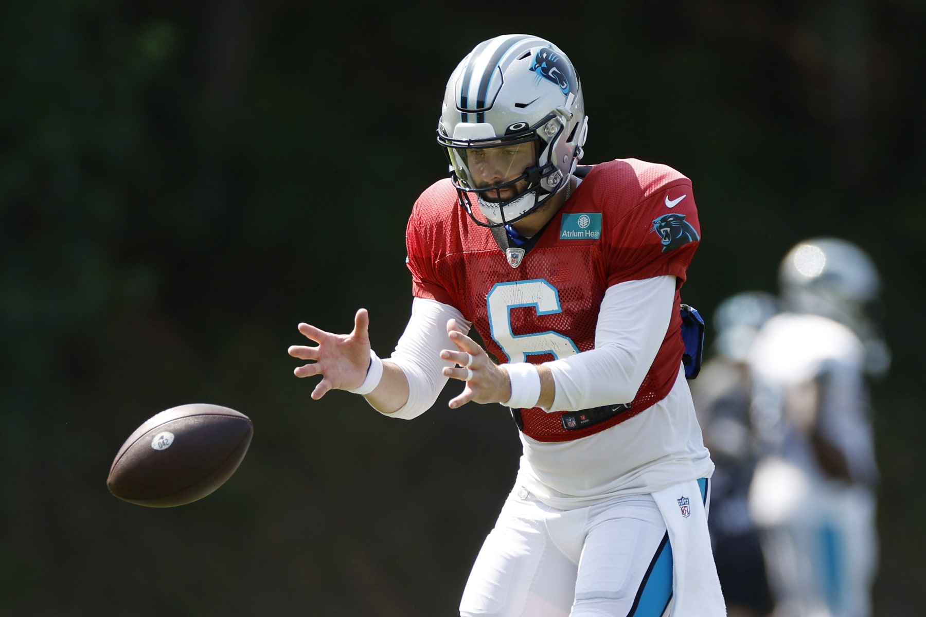 SPARTANBURG, SOUTH CAROLINA - AUGUST 02: Baker Mayfield #6 of the Carolina Panthers takes a snap during training camp at Wofford College on August 02, 2022 in Spartanburg, South Carolina. (Photo by Jared C. Tilton/Getty Images)