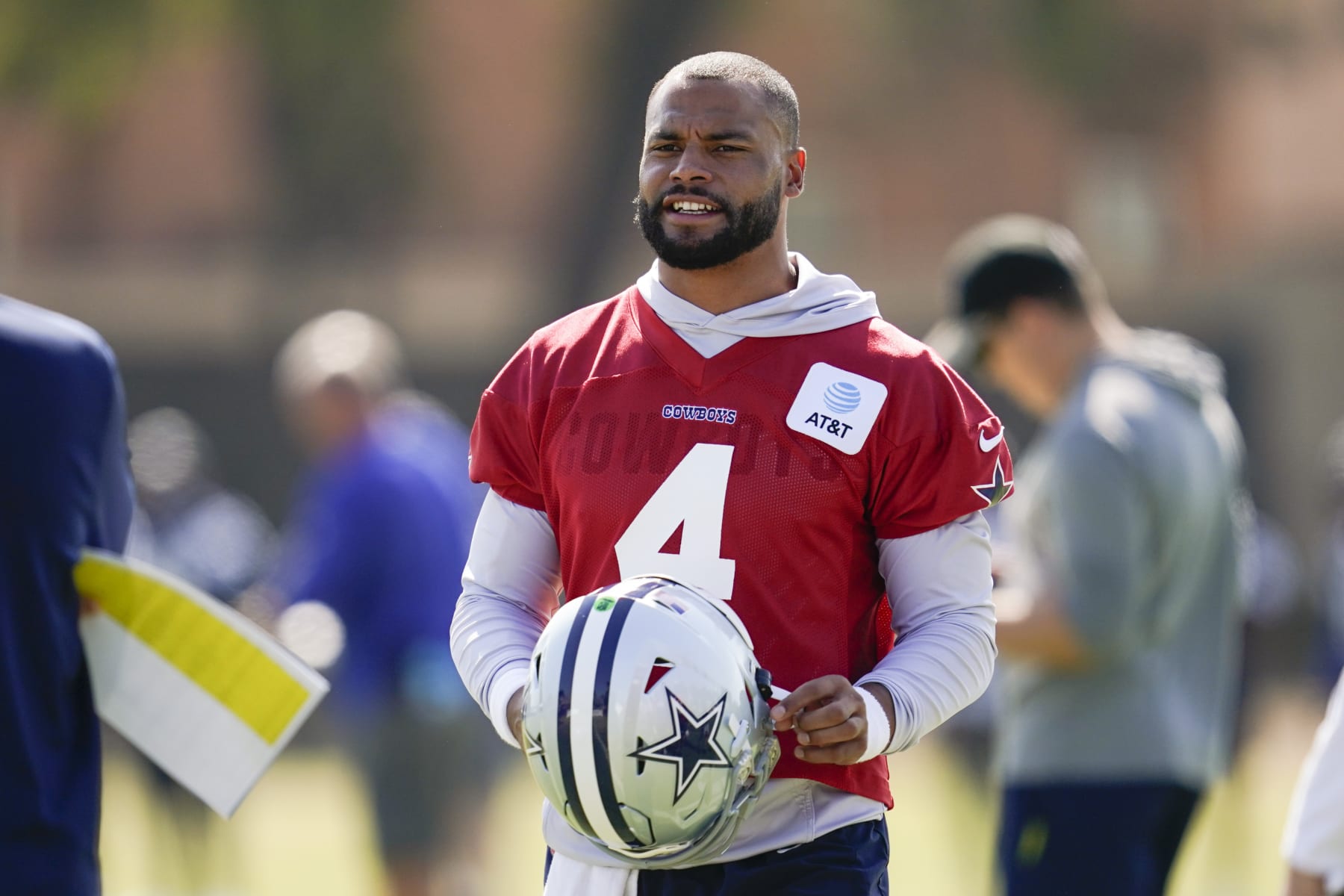 Dallas Cowboys quarterback Dak Prescott (4) participates in drills at the NFL football team's practice facility in Oxnard, Calif. Wednesday, Aug. 3, 2022. (AP Photo/Ashley Landis)