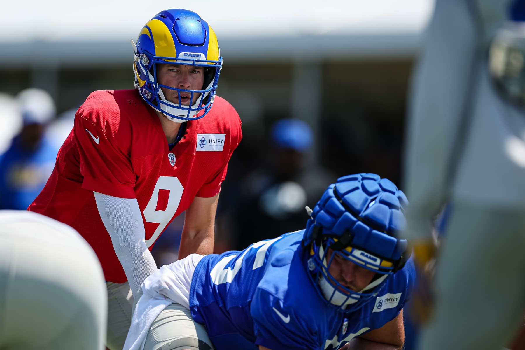 IRVINE, CA - JULY 29: Matthew Stafford #9 of the Los Angeles Rams looks over the defense during training camp at University of California Irvine on July 29, 2022 in Irvine, California. (Photo by Scott Taetsch/Getty Images)