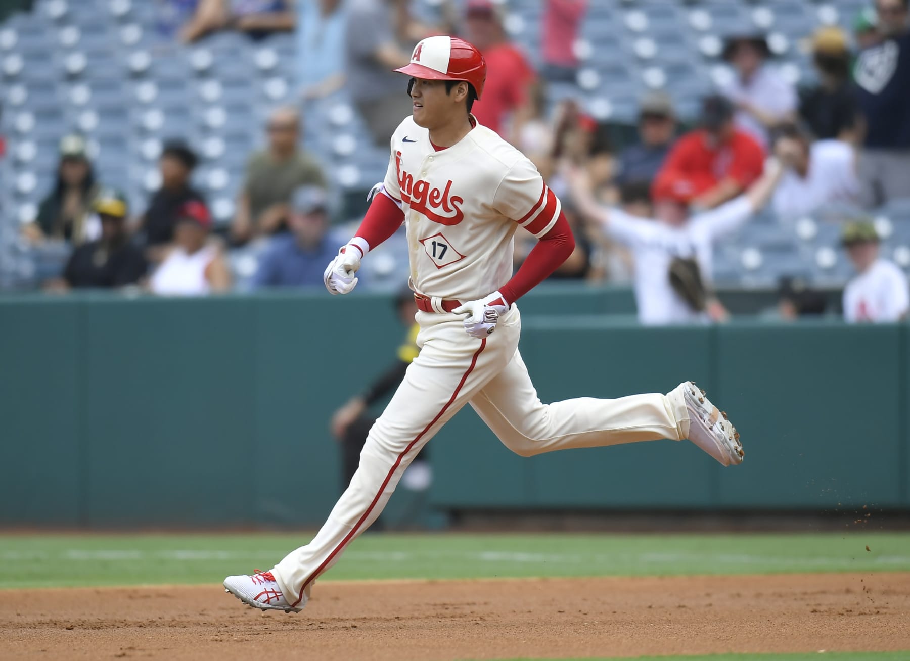 ANAHEIM, CA - AUGUST 04: Shohei Ohtani #17 of the Los Angeles Angels runs toward second after hitting a home run against the Oakland Athletics in the first inning at Angel Stadium of Anaheim on August 4, 2022 in Anaheim, California. (Photo by John McCoy/Getty Images) ANAHEIM, CA - AUGUST 04: Shohei Ohtani #17 of the Los Angeles Angels runs toward second after hitting a home run against the Oakland Athletics in the first inning at Angel Stadium of Anaheim on August 4, 2022 in Anaheim, California. (Photo by John McCoy/Getty Images)