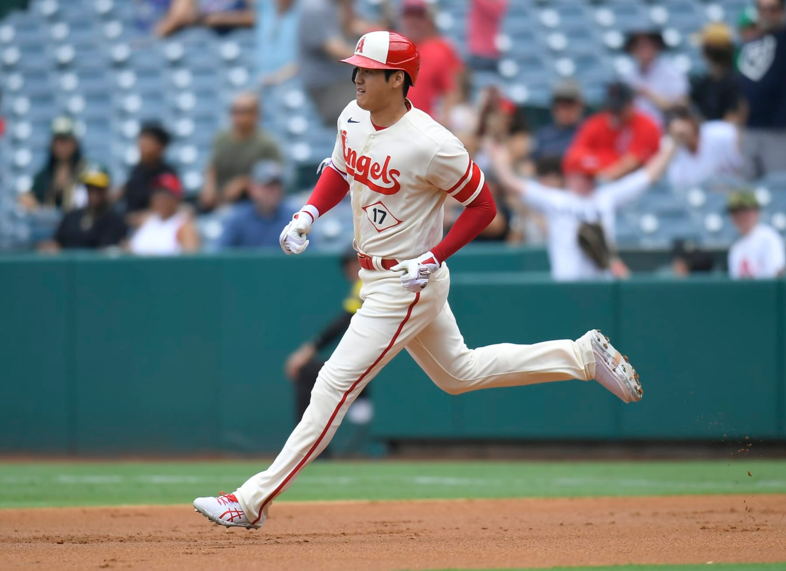 ANAHEIM, CA - AUGUST 04: Shohei Ohtani #17 of the Los Angeles Angels runs toward second after hitting a home run against the Oakland Athletics in the first inning at Angel Stadium of Anaheim on August 4, 2022 in Anaheim, California. (Photo by John McCoy/Getty Images)