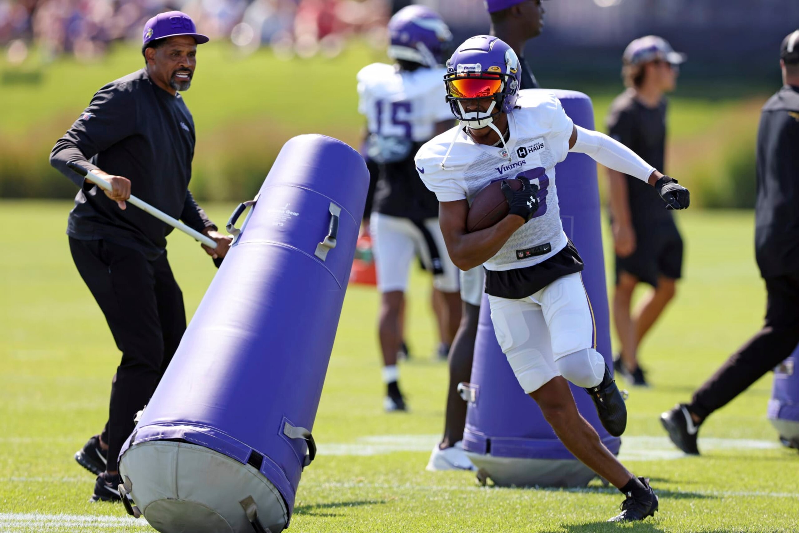 Minnesota Vikings wide receiver Justin Jefferson (18) takes part in the drills at the NFL football team's practice facility in Eagan, Minn., Friday, Aug. 5, 2022. (AP Photo/Stacy Bengs)