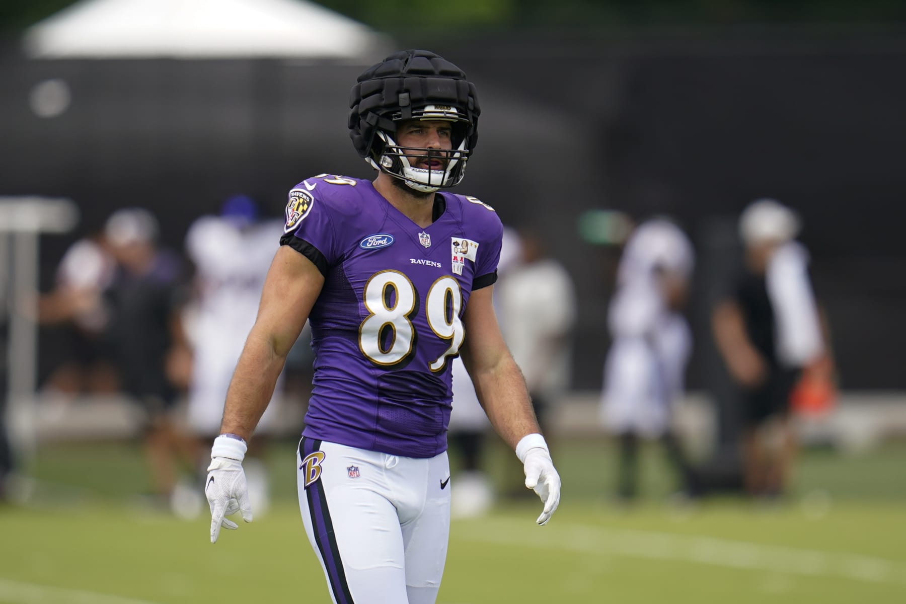 Baltimore Ravens tight end Mark Andrews looks on during the team's NFL football practice, Monday, Aug. 1, 2022, in Owings Mills, Md. (AP Photo/Julio Cortez)