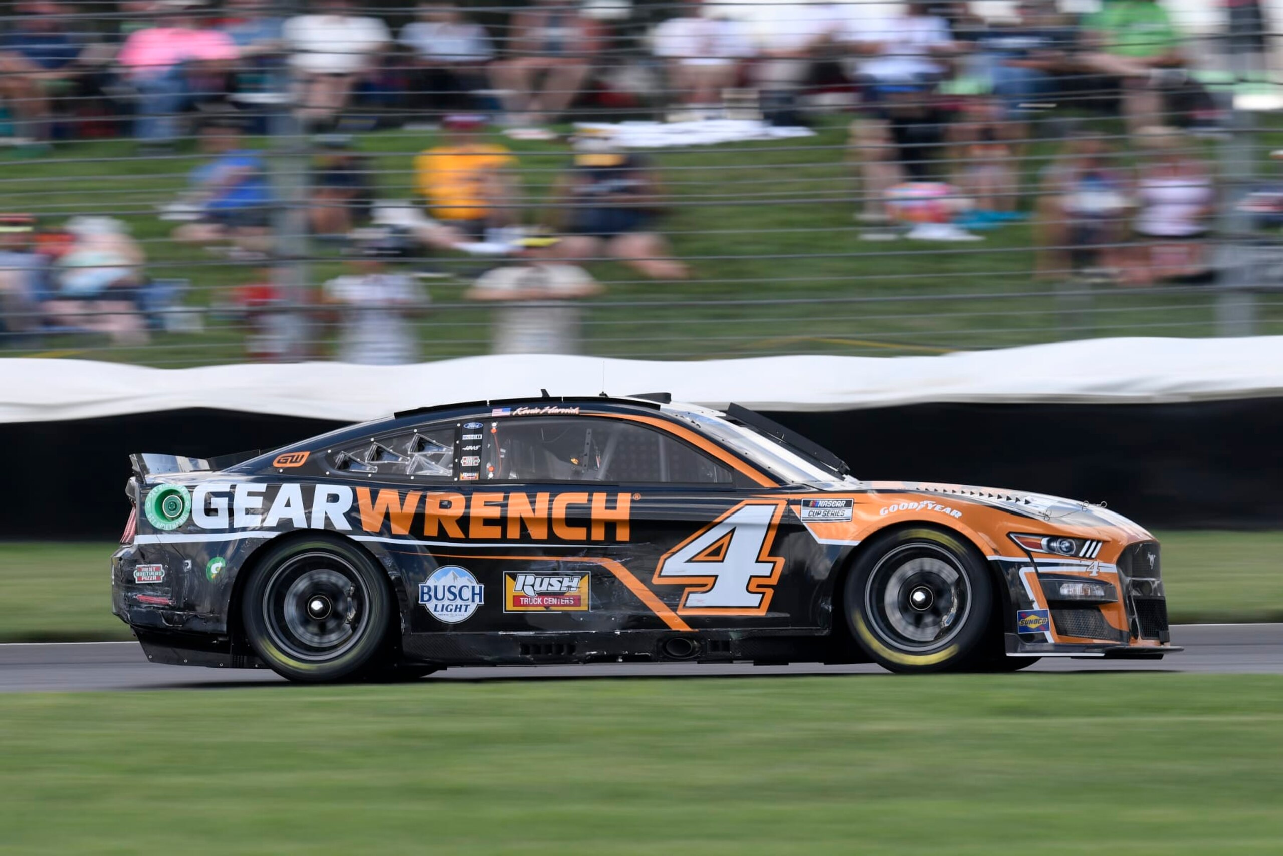 INDIANAPOLIS, IN - JULY 31: Kevin Harvick (#4 Stewart Haas Racing GEARWRENCH Ford) drives off of turn seven during the NASCAR Cup Series Verizon 200 at the Brickyard on July 31, 2022, at the Indianapolis Motor Speedway Road Course in Indianapolis, Indiana. (Photo by Michael Allio/Icon Sportswire via Getty Images)