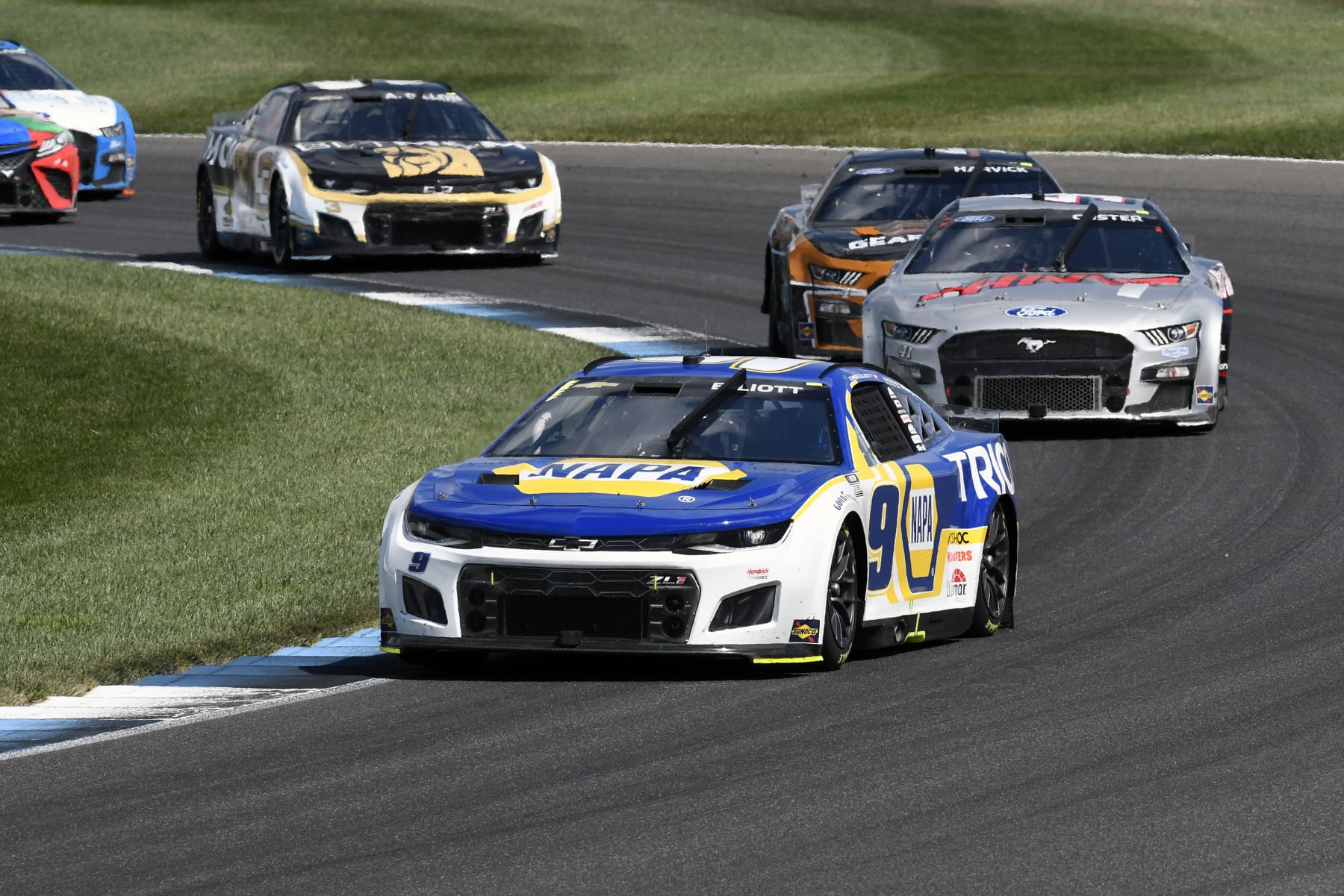 INDIANAPOLIS, IN - JULY 31: Chase Elliott (#9 Hendrick Motorsports NAPA Auto Parts Chevrolet) leads Cole Custer (#41 Stewart Haas Racing HaasTooling.com Ford), Kevin Harvick (#4 Stewart Haas Racing GEARWRENCH Ford), and Austin Dillon (#3 Richard Childress Racing BetMGM Chevrolet) during the NASCAR Cup Series Verizon 200 at the Brickyard on the Indianapolis Motor Speedway Road Course in Speedway, Indiana. (Photo by David Allio/Icon Sportswire via Getty Images)