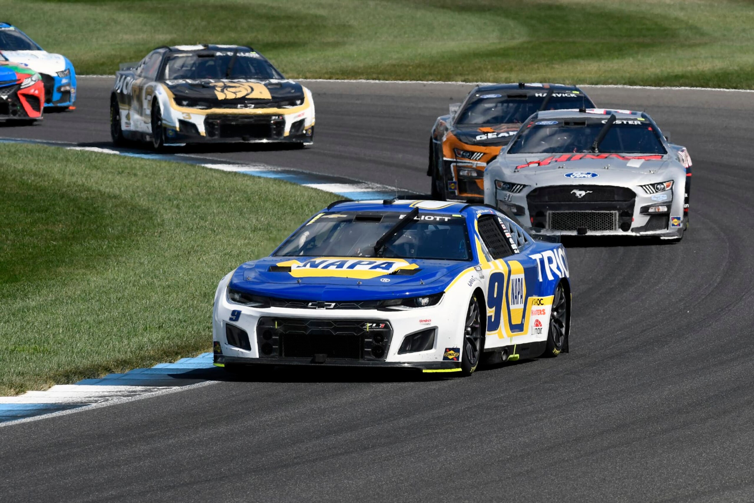INDIANAPOLIS, IN - JULY 31: Chase Elliott (#9 Hendrick Motorsports NAPA Auto Parts Chevrolet) leads Cole Custer (#41 Stewart Haas Racing HaasTooling.com Ford), Kevin Harvick (#4 Stewart Haas Racing GEARWRENCH Ford), and Austin Dillon (#3 Richard Childress Racing BetMGM Chevrolet) during the NASCAR Cup Series Verizon 200 at the Brickyard on the Indianapolis Motor Speedway Road Course in Speedway, Indiana. (Photo by David Allio/Icon Sportswire via Getty Images)