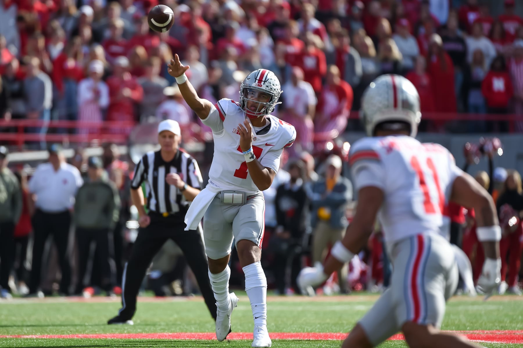 LINCOLN, NE - NOVEMBER 6: Quarterback C.J. Stroud #7 of the Ohio State Buckeyes passes to wide receiver Jaxon Smith-Njigba #11 against the Nebraska Cornhuskers in the second half at Memorial Stadium on November 6, 2021 in Lincoln, Nebraska. (Photo by Steven Branscombe/Getty Images)