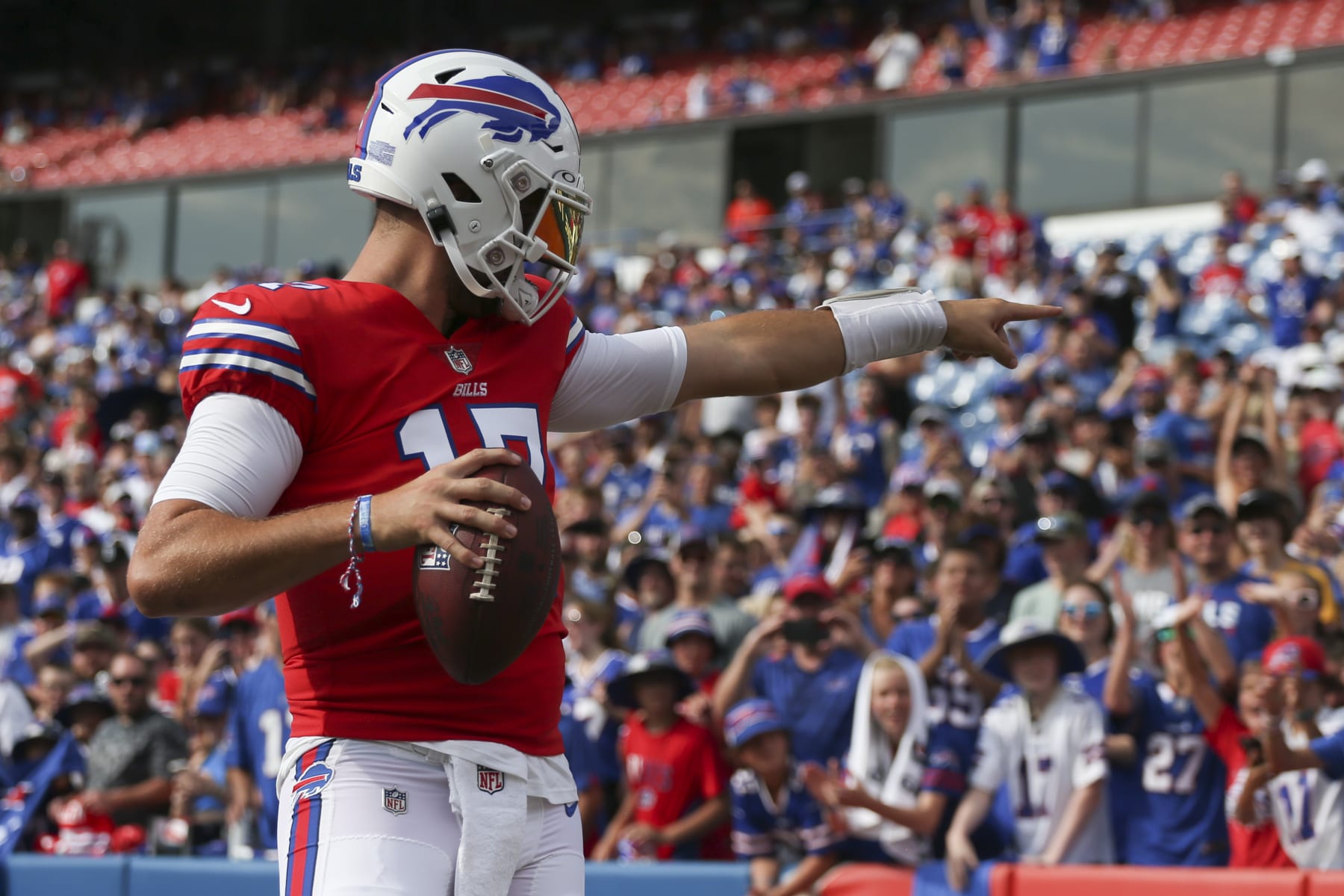 ORCHARD PARK, NEW YORK - AUGUST 05: Josh Allen #17 of the Buffalo Bills throws to fans during practice on August 05, 2022 in Orchard Park, New York. (Photo by Joshua Bessex/Getty Images)