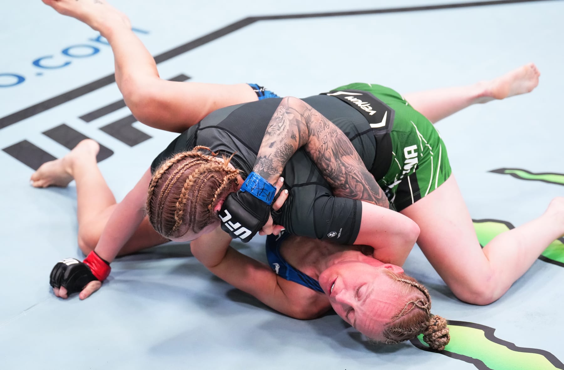 LAS VEGAS, NEVADA - AUGUST 06: (R-L) Cory McKenna of Wales battles Miranda Granger in a strawweight fight during the UFC Fight Night event at UFC APEX on August 06, 2022 in Las Vegas, Nevada. (Photo by Chris Unger/Zuffa LLC)