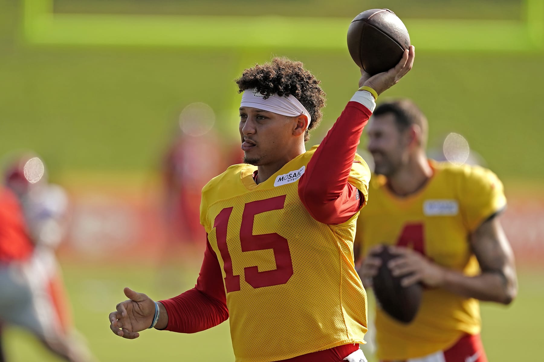 Kansas City Chiefs quarterback Patrick Mahomes throws during NFL football training camp Monday, Aug. 1, 2022, in St. Joseph, Mo. (AP Photo/Charlie Riedel)