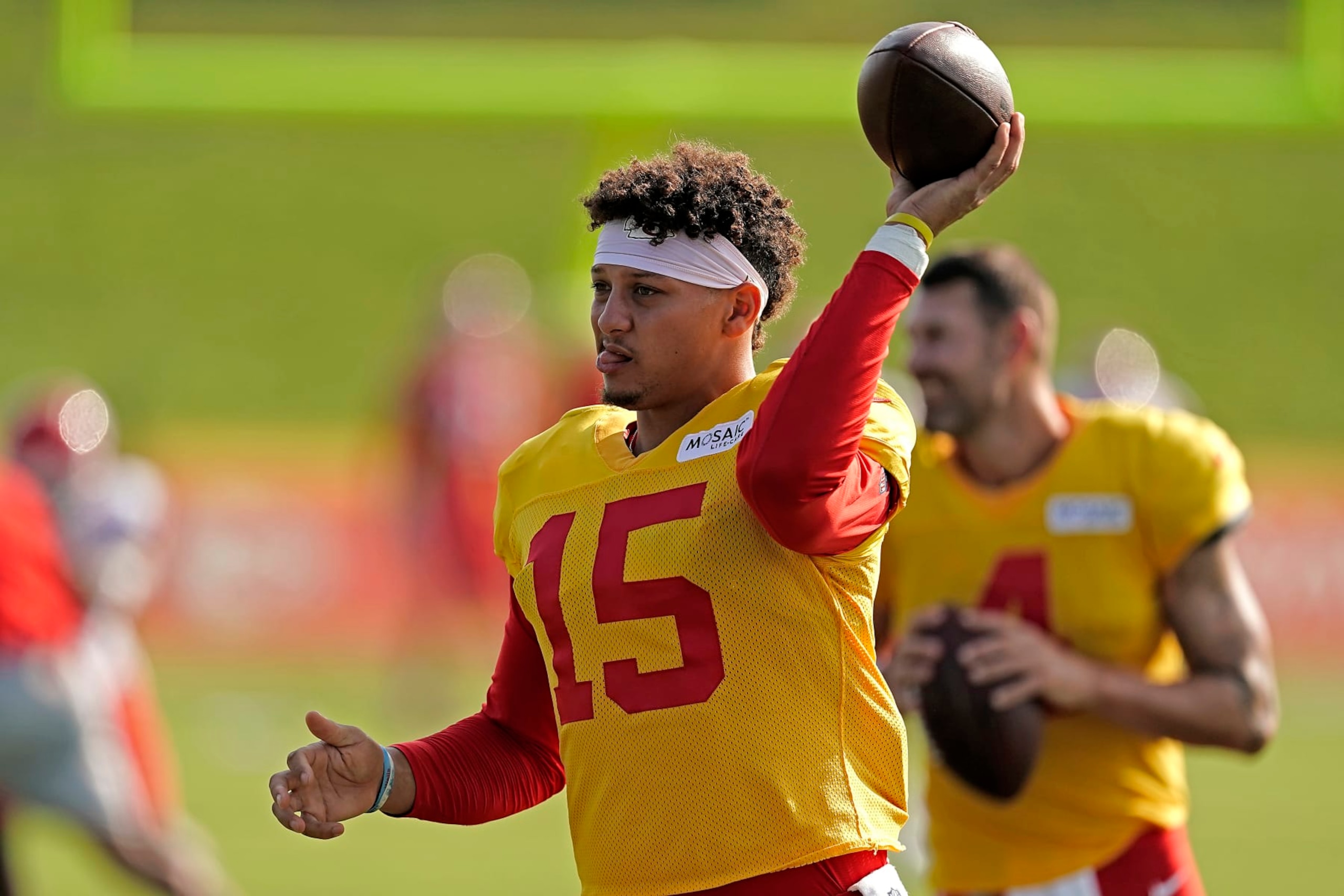 Kansas City Chiefs quarterback Patrick Mahomes throws during NFL football training camp Monday, Aug. 1, 2022, in St. Joseph, Mo. (AP Photo/Charlie Riedel)