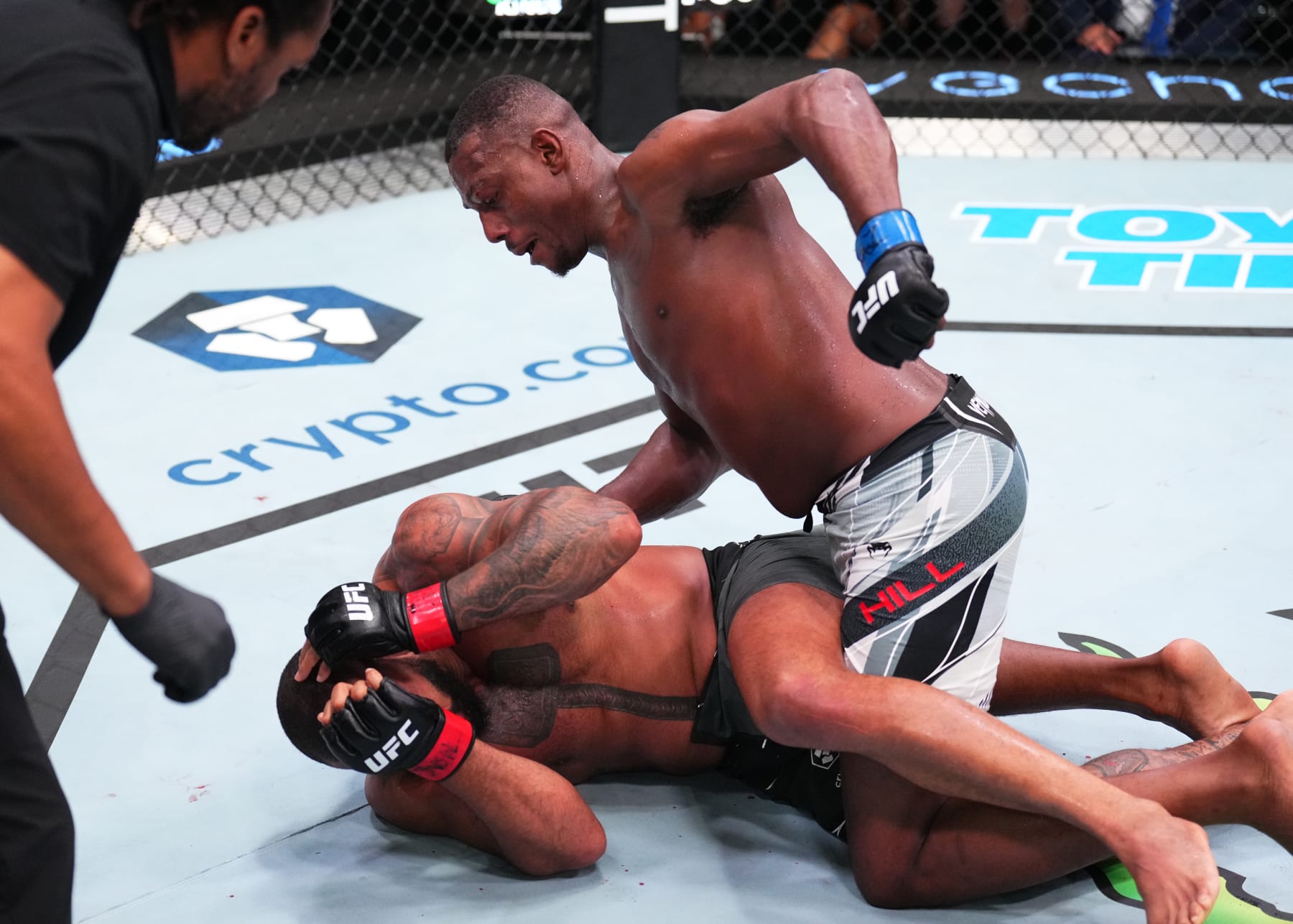 LAS VEGAS, NEVADA - AUGUST 06: (R-L) Jamahal Hill punches Thiago Santos of Brazil in a light heavyweight fight during the UFC Fight Night event at UFC APEX on August 06, 2022 in Las Vegas, Nevada. (Photo by Chris Unger/Zuffa LLC)