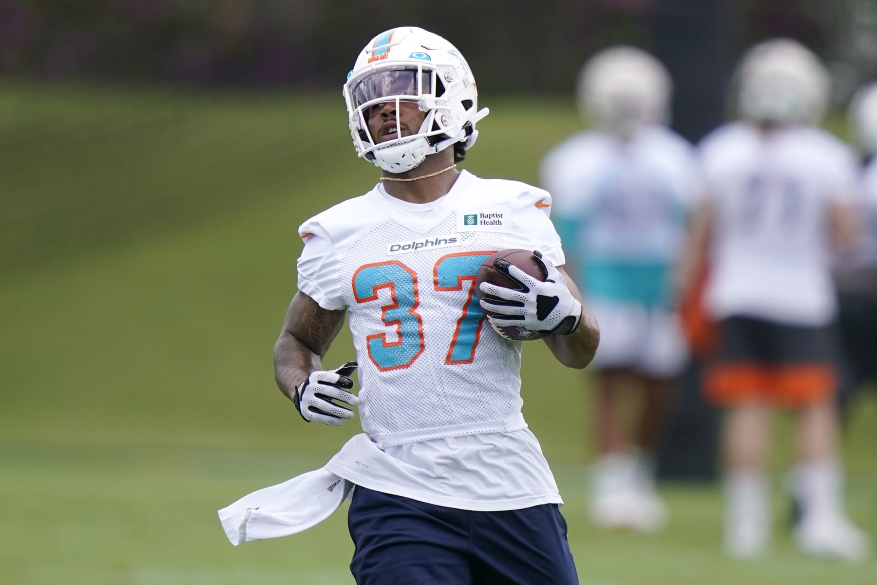 Miami Dolphins running back Myles Gaskin (37) takes part in drills at the NFL football team's practice facility, Tuesday, May 24, 2022, in Miami Gardens, Fla. (AP Photo/Lynne Sladky)