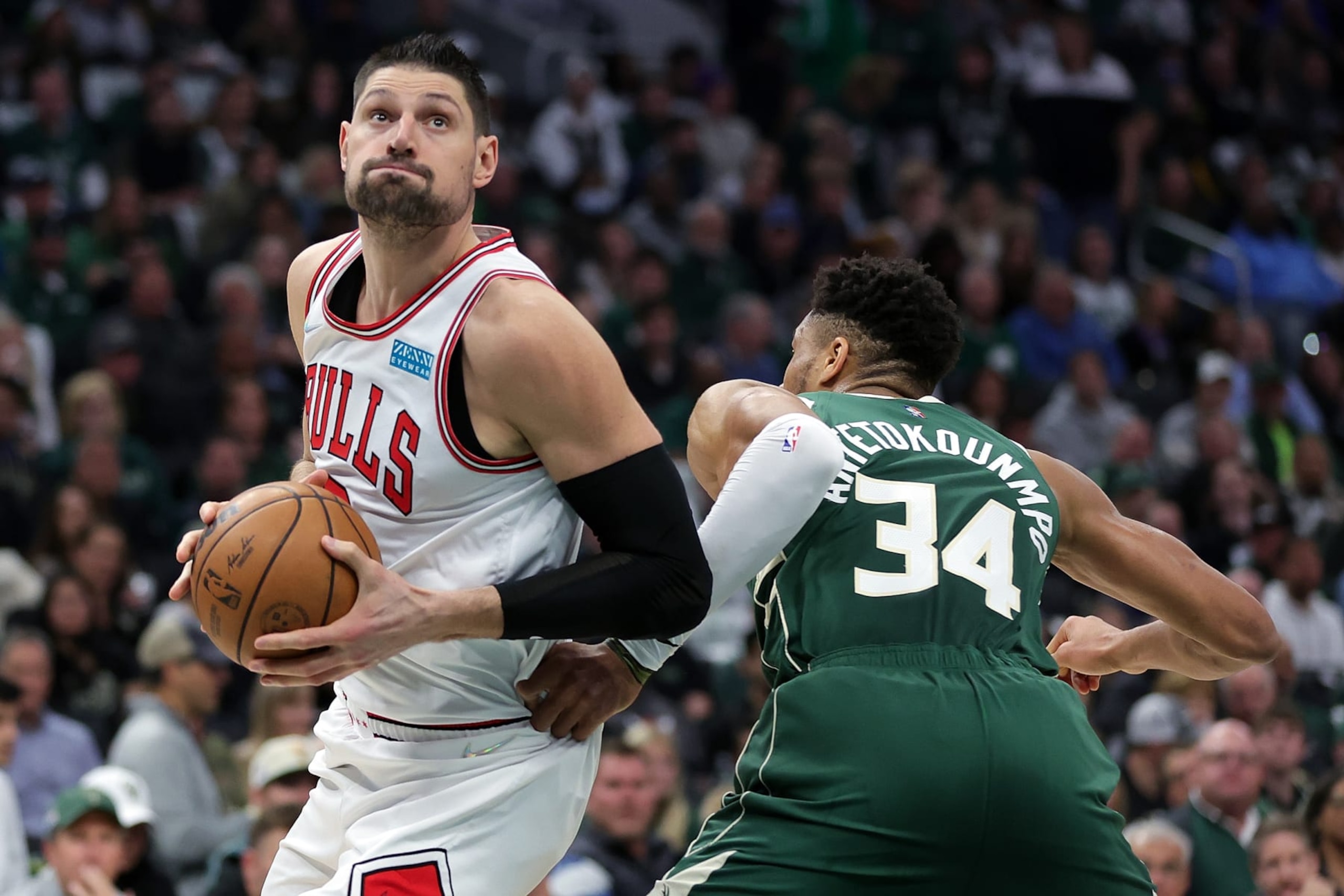 MILWAUKEE, WISCONSIN - APRIL 27: Nikola Vucevic #9 of the Chicago Bulls drives around Giannis Antetokounmpo #34 of the Milwaukee Bucks in the second quarter during Game Five of the Eastern Conference First Round Playoffs at Fiserv Forum on April 27, 2022 in Milwaukee, Wisconsin. NOTE TO USER: User expressly acknowledges and agrees that, by downloading and or using this photograph, User is consenting to the terms and conditions of the Getty Images License Agreement. (Photo by Stacy Revere/Getty Images) MILWAUKEE, WISCONSIN - APRIL 27: Nikola Vucevic #9 of the Chicago Bulls drives around Giannis Antetokounmpo #34 of the Milwaukee Bucks in the second quarter during Game Five of the Eastern Conference First Round Playoffs at Fiserv Forum on April 27, 2022 in Milwaukee, Wisconsin. NOTE TO USER: User expressly acknowledges and agrees that, by downloading and or using this photograph, User is consenting to the terms and conditions of the Getty Images License Agreement. (Photo by Stacy Revere/Getty Images)