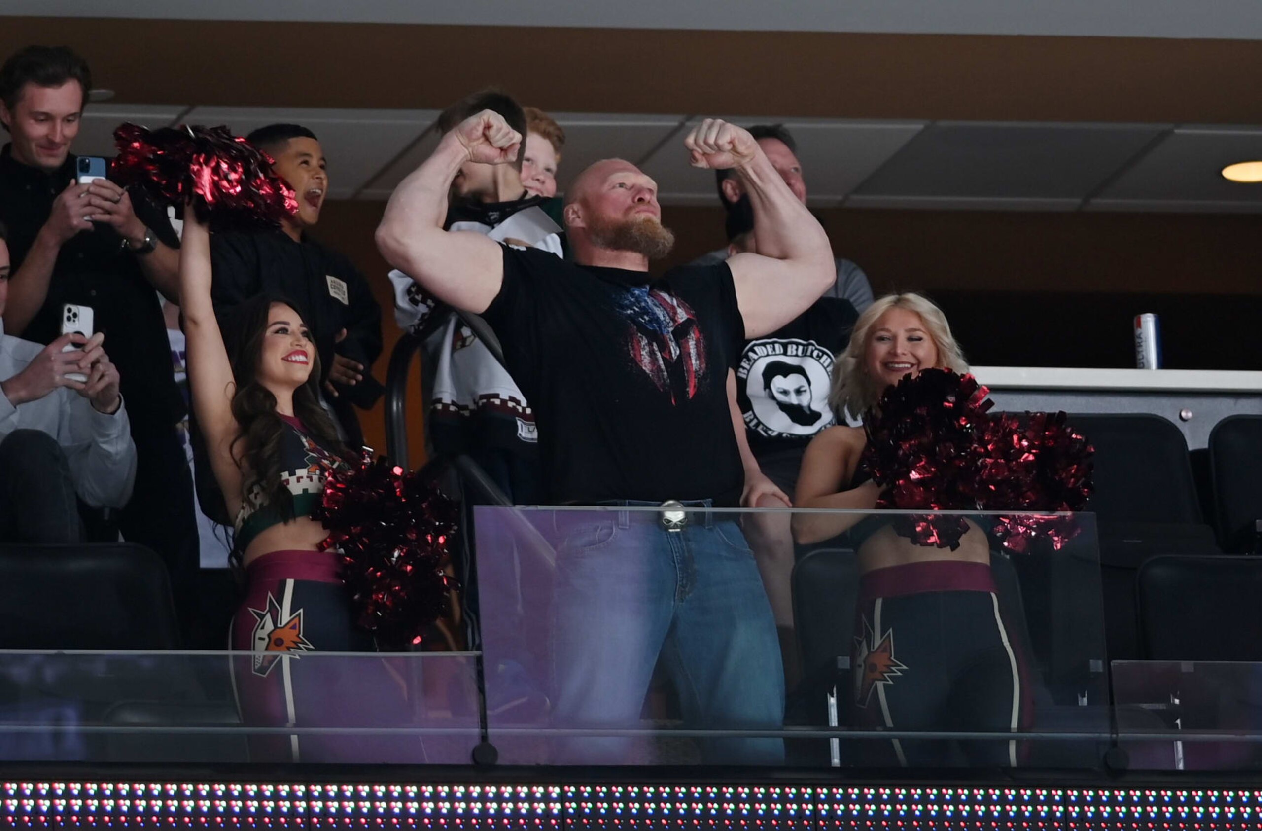 GLENDALE, ARIZONA - APRIL 22: Brock Lesnar, former WWE champion and UFC champion, flexes for the crowd during a game between the Arizona Coyotes and Washington Capitals at Gila River Arena on April 22, 2022 in Glendale, Arizona. (Photo by Norm Hall/NHLI via Getty Images) GLENDALE, ARIZONA - APRIL 22: Brock Lesnar, former WWE champion and UFC champion, flexes for the crowd during a game between the Arizona Coyotes and Washington Capitals at Gila River Arena on April 22, 2022 in Glendale, Arizona. (Photo by Norm Hall/NHLI via Getty Images)
