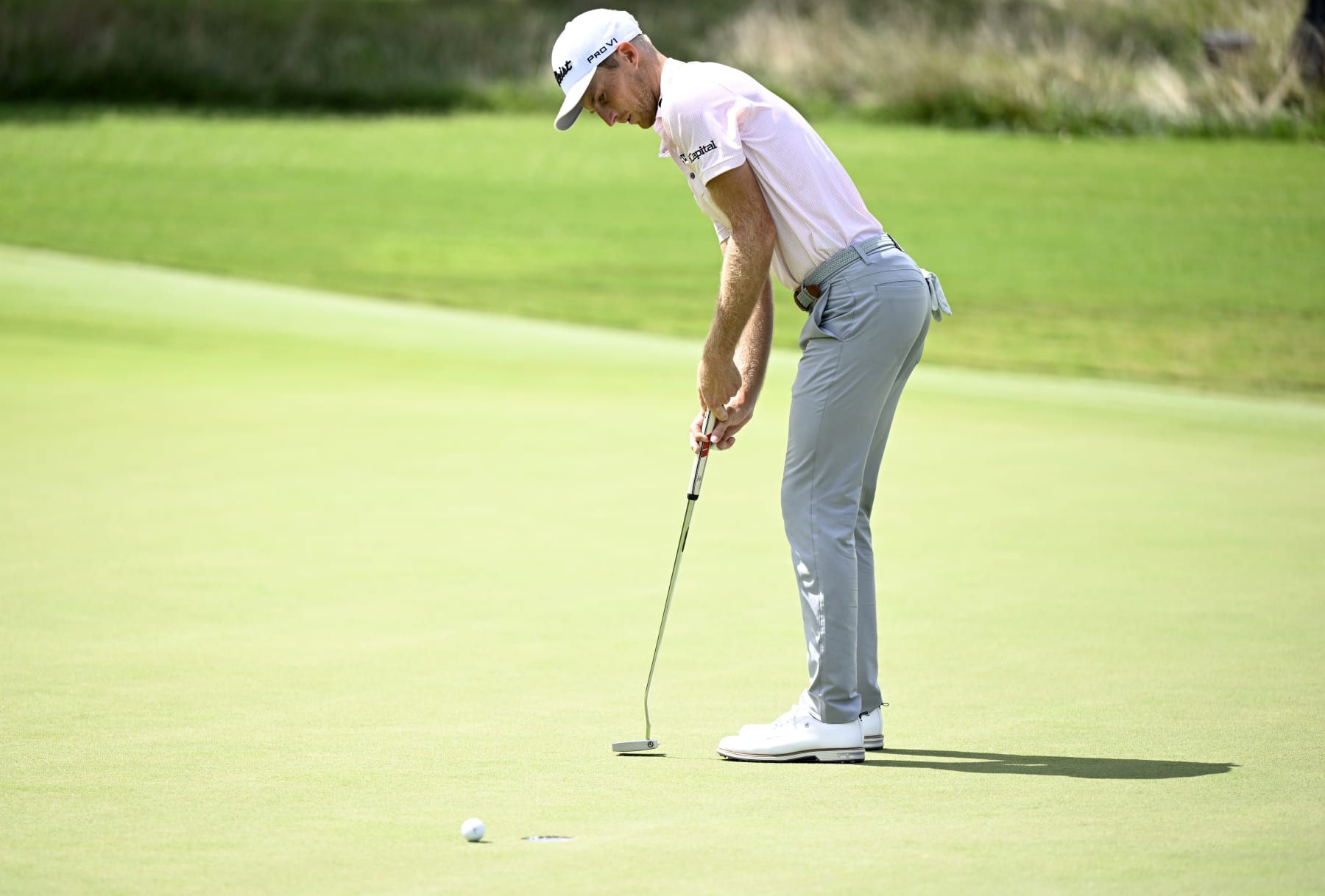 GREENSBORO, NORTH CAROLINA - AUGUST 06: Will Zalatoris of the United States putts on the sixth green during the third round of the Wyndham Championship at Sedgefield Country Club on August 06, 2022 in Greensboro, North Carolina. (Photo by Eakin Howard/Getty Images)