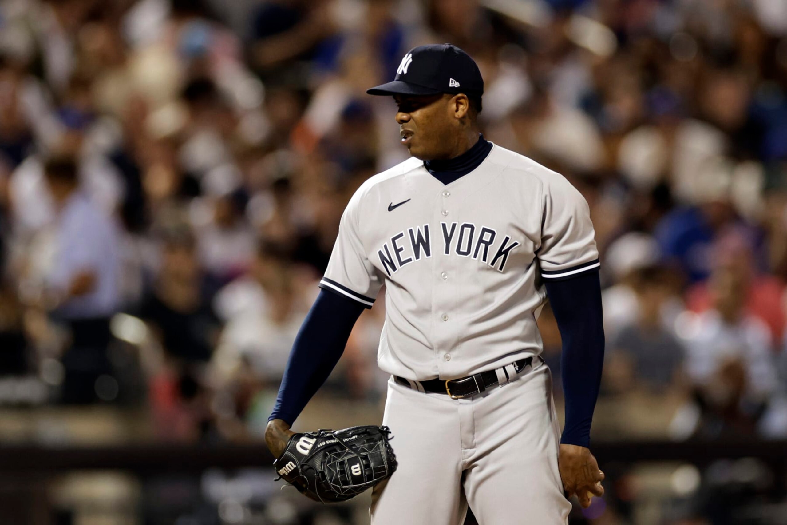 NEW YORK, NY - JULY 26: Aroldis Chapman #54 of the New York Yankees pitches during the sixth inning against the New York Mets at Citi Field on July 26, 2022 in New York City. (Photo by Adam Hunger/Getty Images)