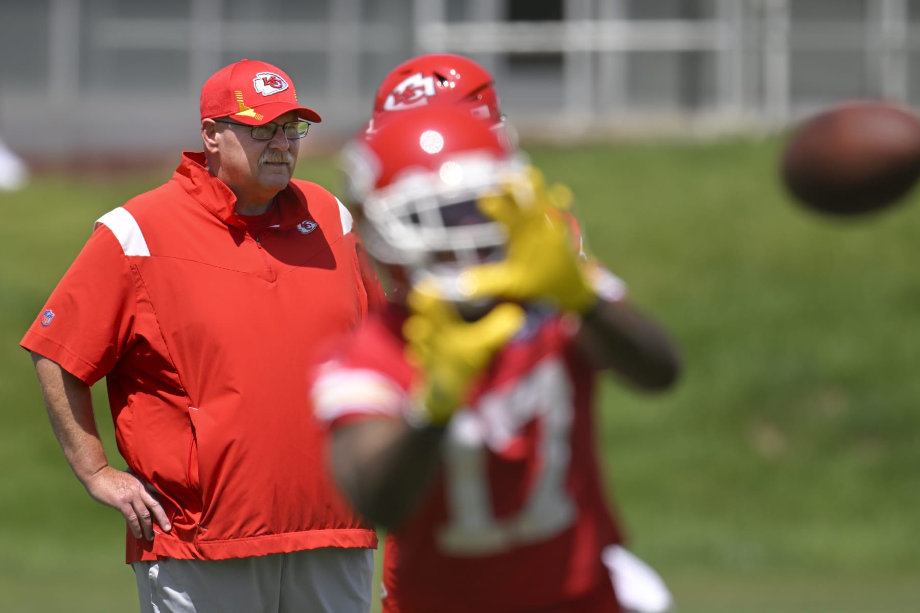 Kansas City Chiefs head coach Andy Reid watches as his players take part in the NFL football team's mandatory minicamp, Tuesday, June 14, 2022, in Kansas City, Mo. (AP Photo/Reed Hoffmann)