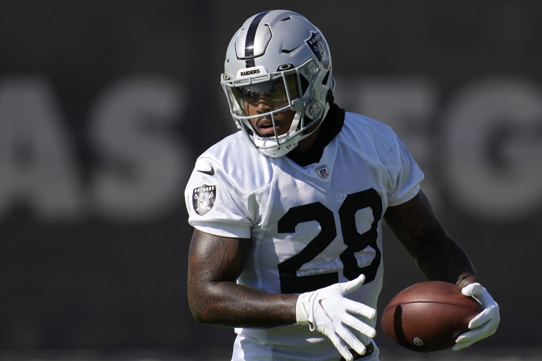 Las Vegas Raiders' Josh Jacobs practices during NFL football training camp, Monday, Aug. 1, 2022, in Henderson, Nev. (AP Photo/John Locher) Las Vegas Raiders' Josh Jacobs practices during NFL football training camp, Monday, Aug. 1, 2022, in Henderson, Nev. (AP Photo/John Locher)