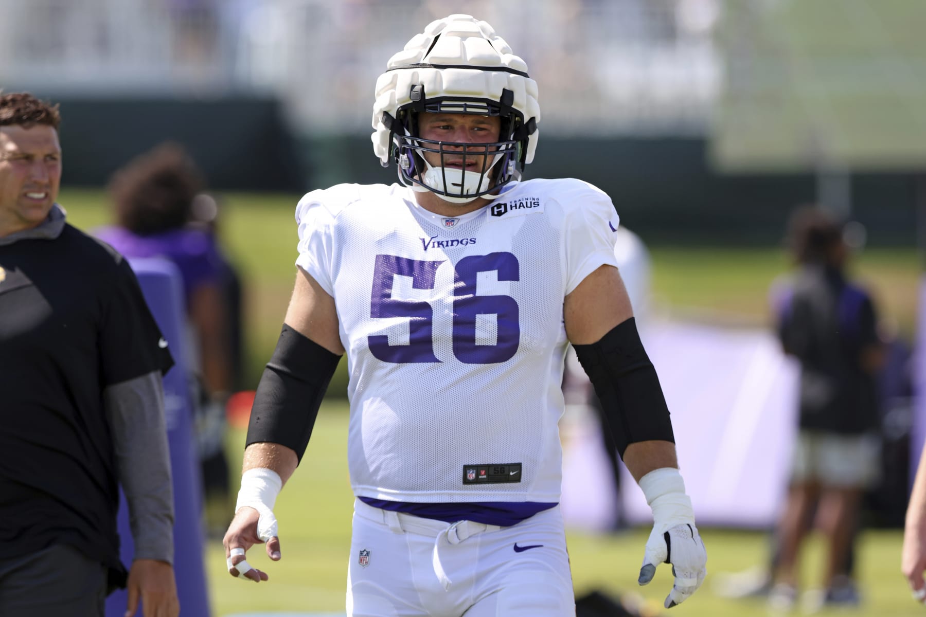 Minnesota Vikings center Garrett Bradbury (56) looks on at the NFL football team's practice facility in Eagan, Minn., Friday, Aug. 5, 2022. (AP Photo/Stacy Bengs) Minnesota Vikings center Garrett Bradbury (56) looks on at the NFL football team's practice facility in Eagan, Minn., Friday, Aug. 5, 2022. (AP Photo/Stacy Bengs)