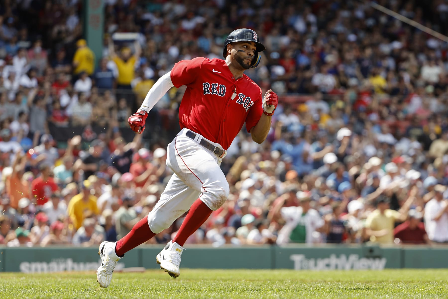 BOSTON, MA - JULY 31: Xander Bogaerts #2 of the Boston Red Sox runs out his two-run double against the Milwaukee Brewers during the fifth inning at Fenway Park on July 31, 2022 in Boston, Massachusetts. (Photo By Winslow Townson/Getty Images)