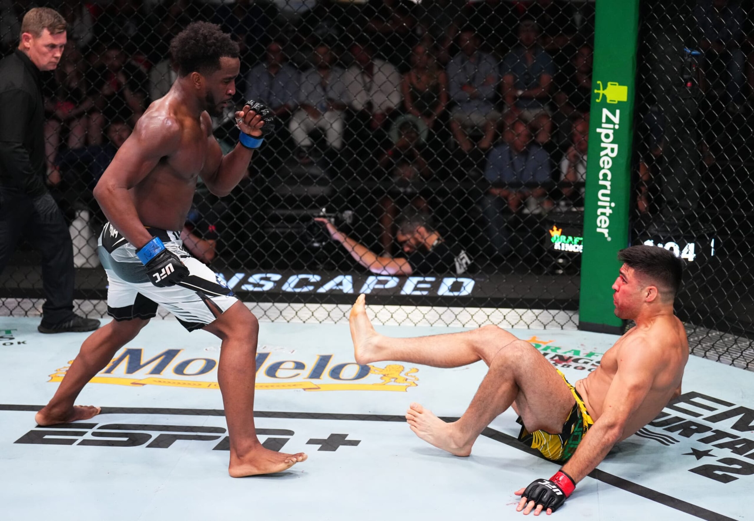 LAS VEGAS, NEVADA - AUGUST 06: (L-R) Geoff Neal drops Vicente Luque in a welterweight fight during the UFC Fight Night event at UFC APEX on August 06, 2022 in Las Vegas, Nevada. (Photo by Chris Unger/Zuffa LLC)